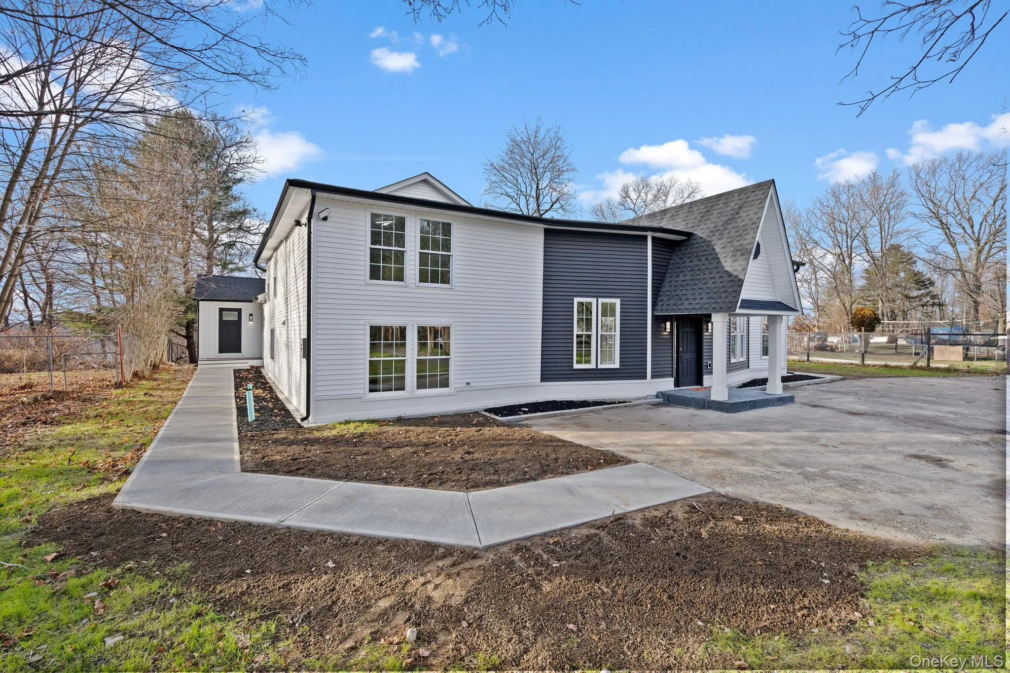 View of front of home featuring roof with shingles View of front of home featuring roof with shingles