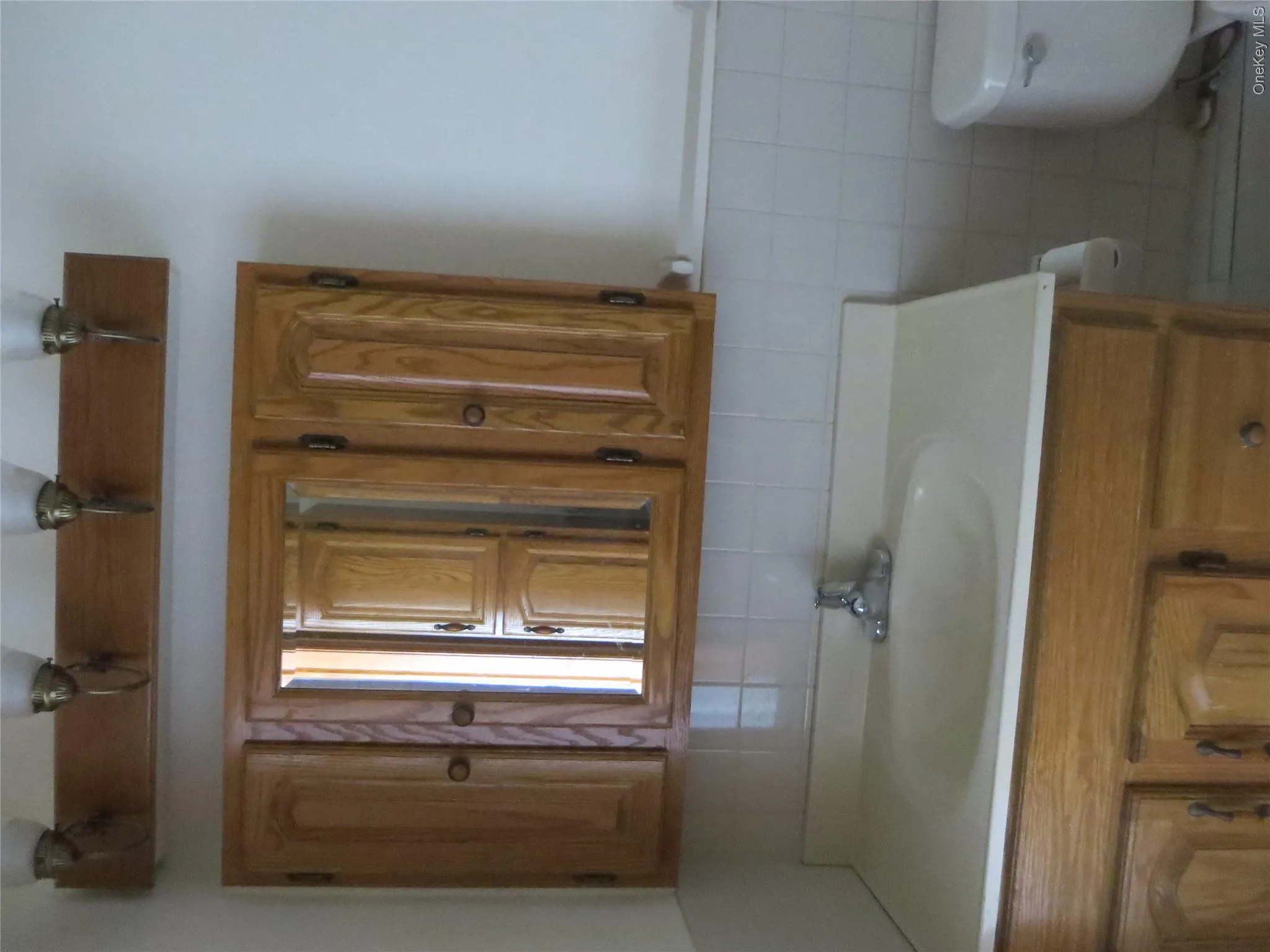 Vanity and medicine chest provide additional storage. Vanity and medicine chest provide additional storage.