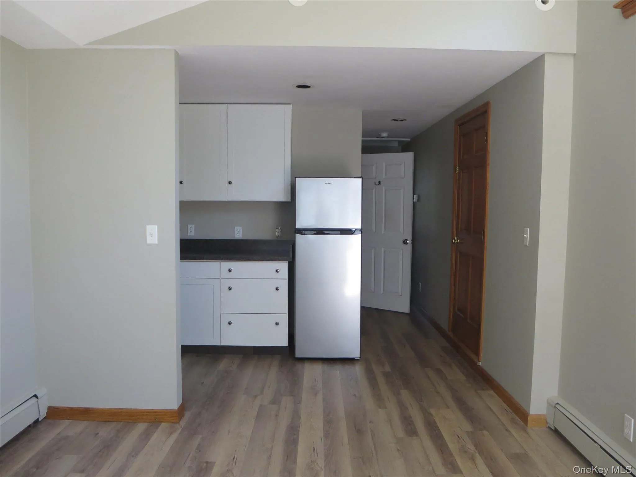 Wood look laminate flooring throughout the apt. Wood look laminate flooring throughout the apt.