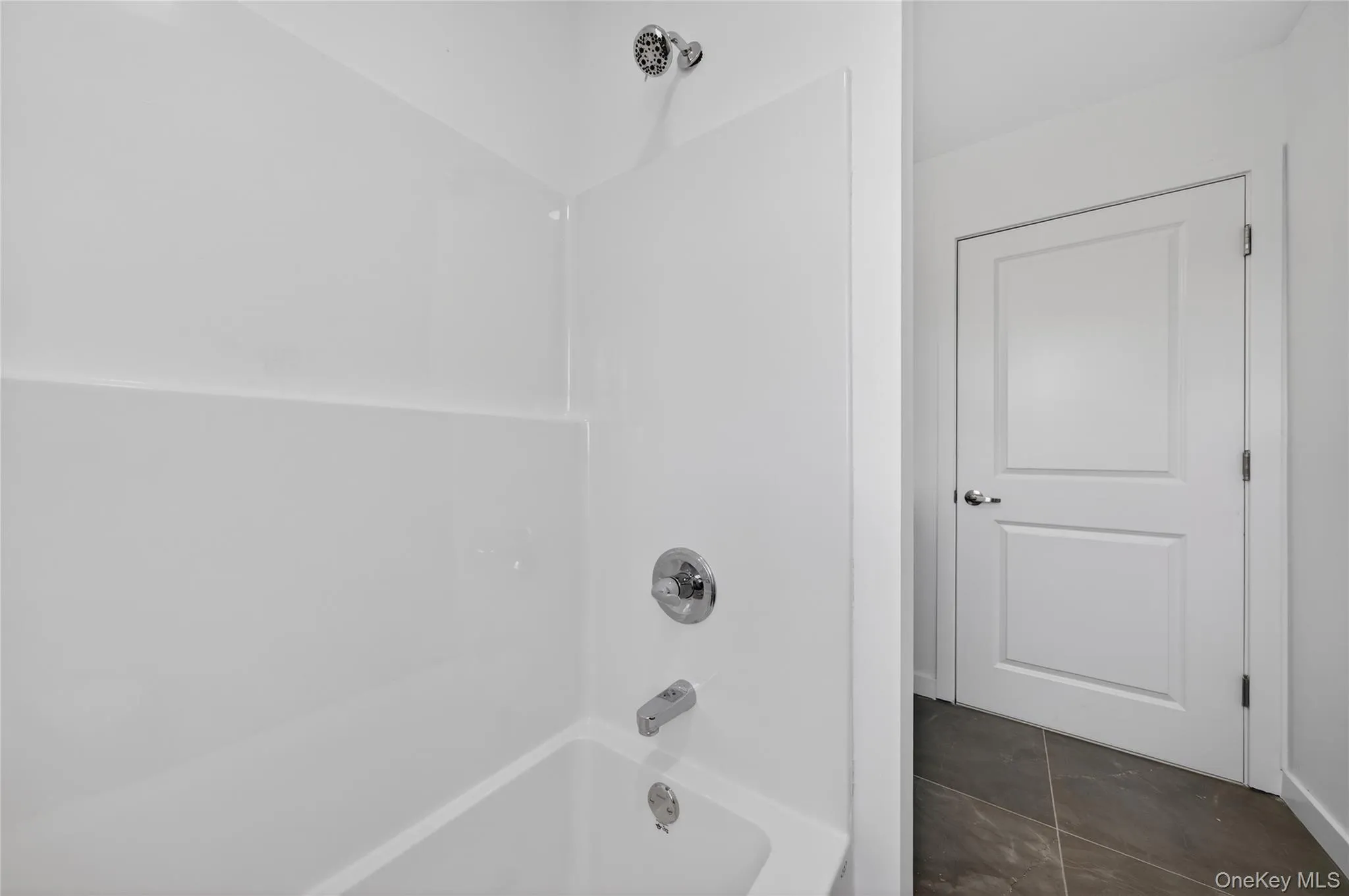 View. Of the full bathroom. Closed door. Notice the vanity is hiding. View. Of the full bathroom. Closed door. Notice the vanity is hiding.