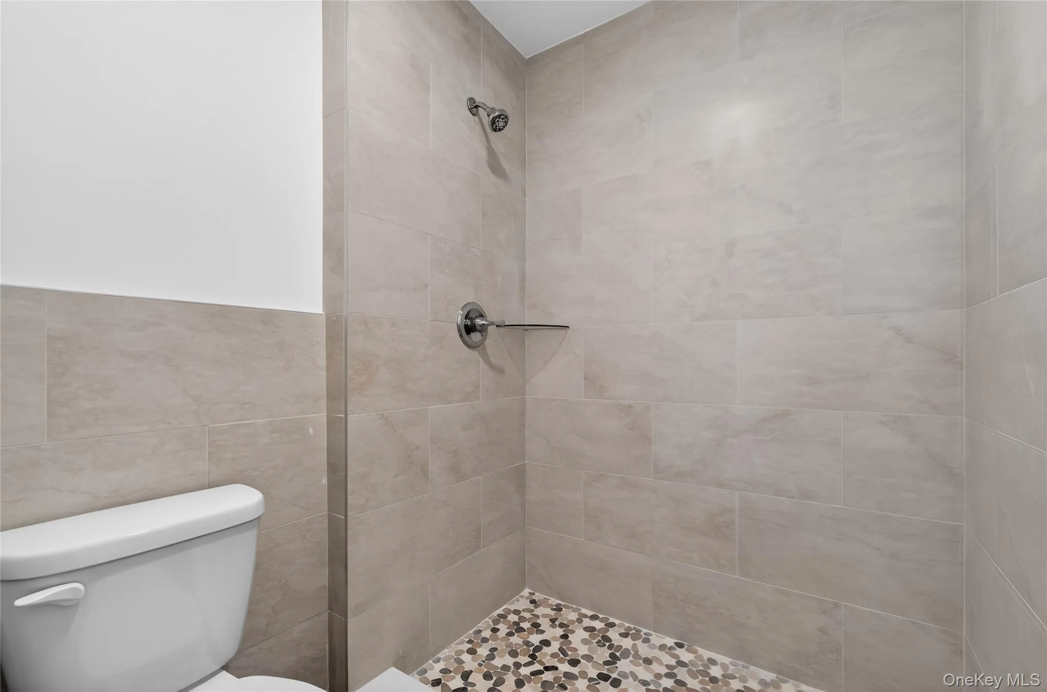 Primary bathroom standing shower. Primary bathroom standing shower.