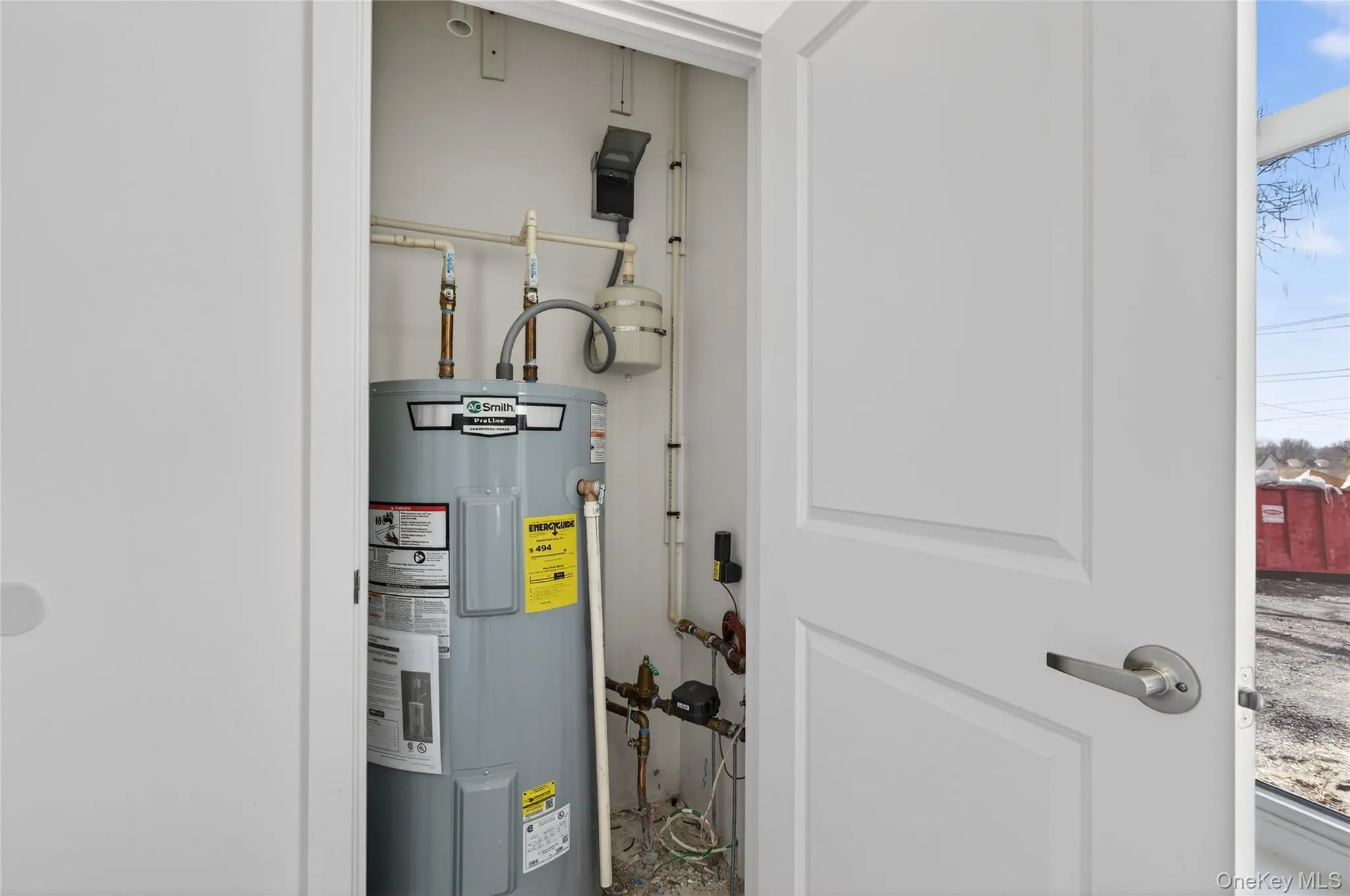 Hot water heater. Utility room. Also has the water meter in there. As well as the. Electrical cutoff. Hot water heater. Utility room. Also has the water meter in there. As well as the. Electrical cutoff.