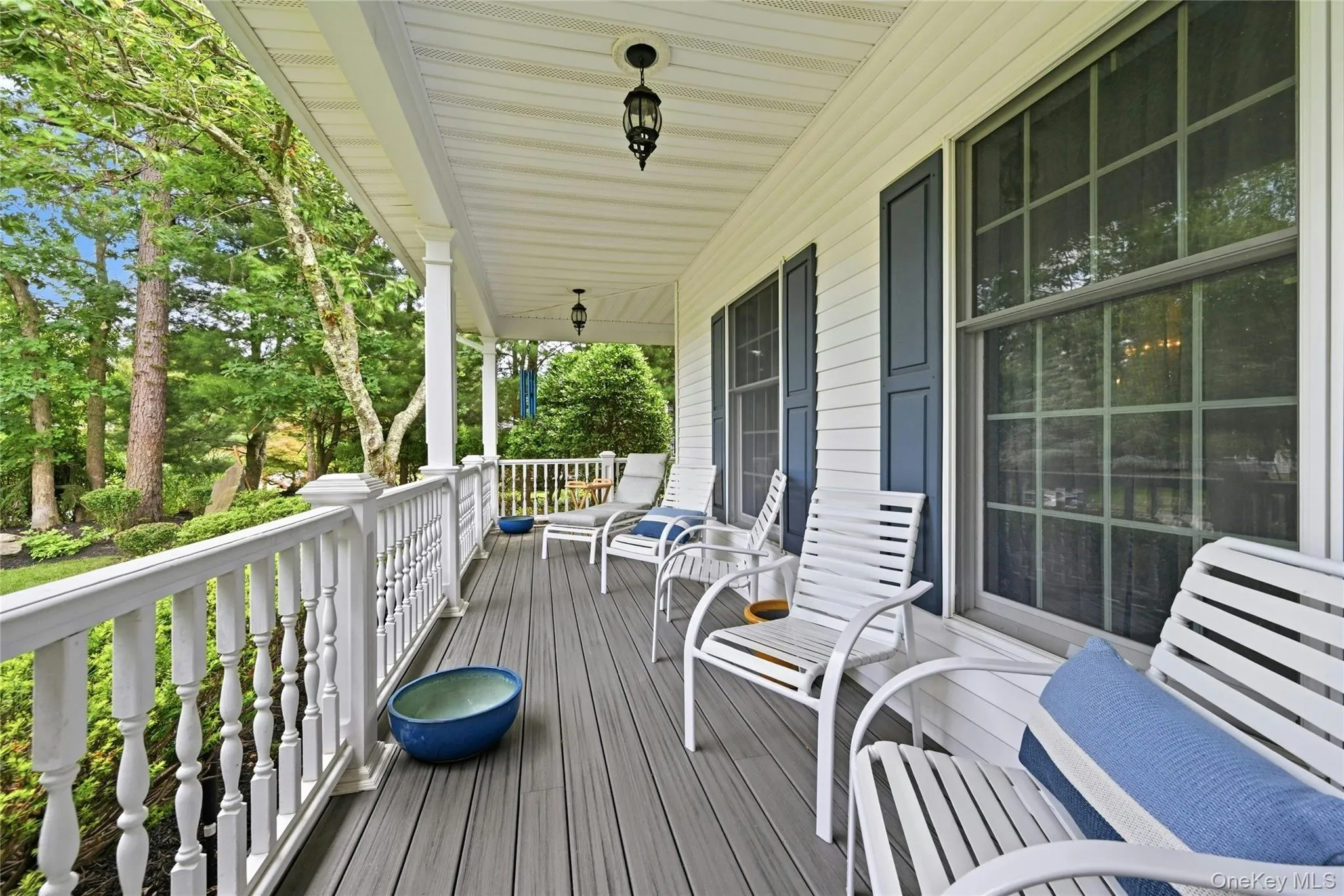 An Oversized Wraparound Front Porch Greets You And Offers All New Composite/Trex Decking/Base And And Leads To The Front Entrance & Into The Home. An Oversized Wraparound Front Porch Greets You And Offers All New Composite/Trex Decking/Base And And Leads To The Front Entrance & Into The Home.