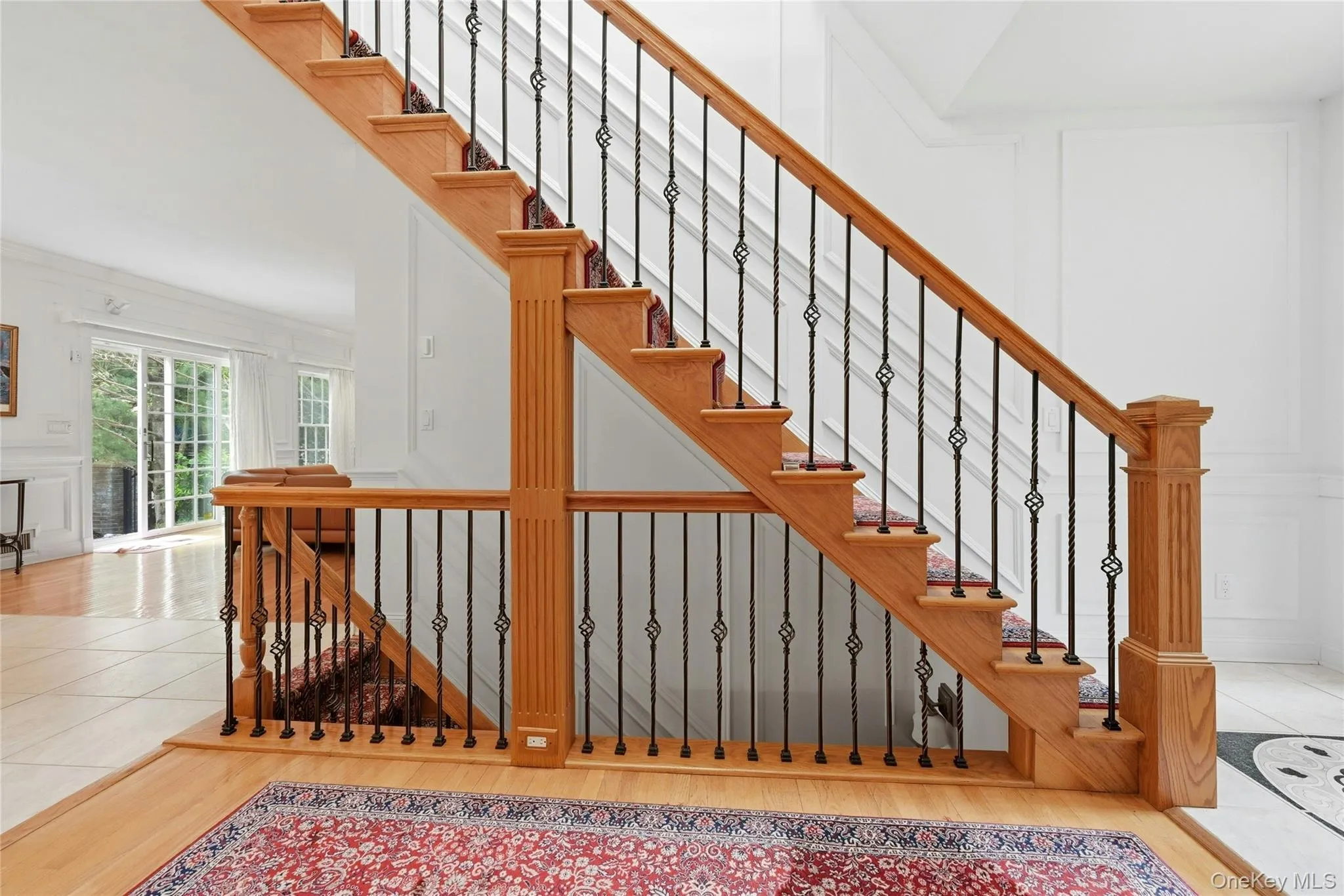 The Stunning Custom Open Stairway To Both The Upper Level/Second Floor & The Lower Level. The Stunning Custom Open Stairway To Both The Upper Level/Second Floor & The Lower Level.