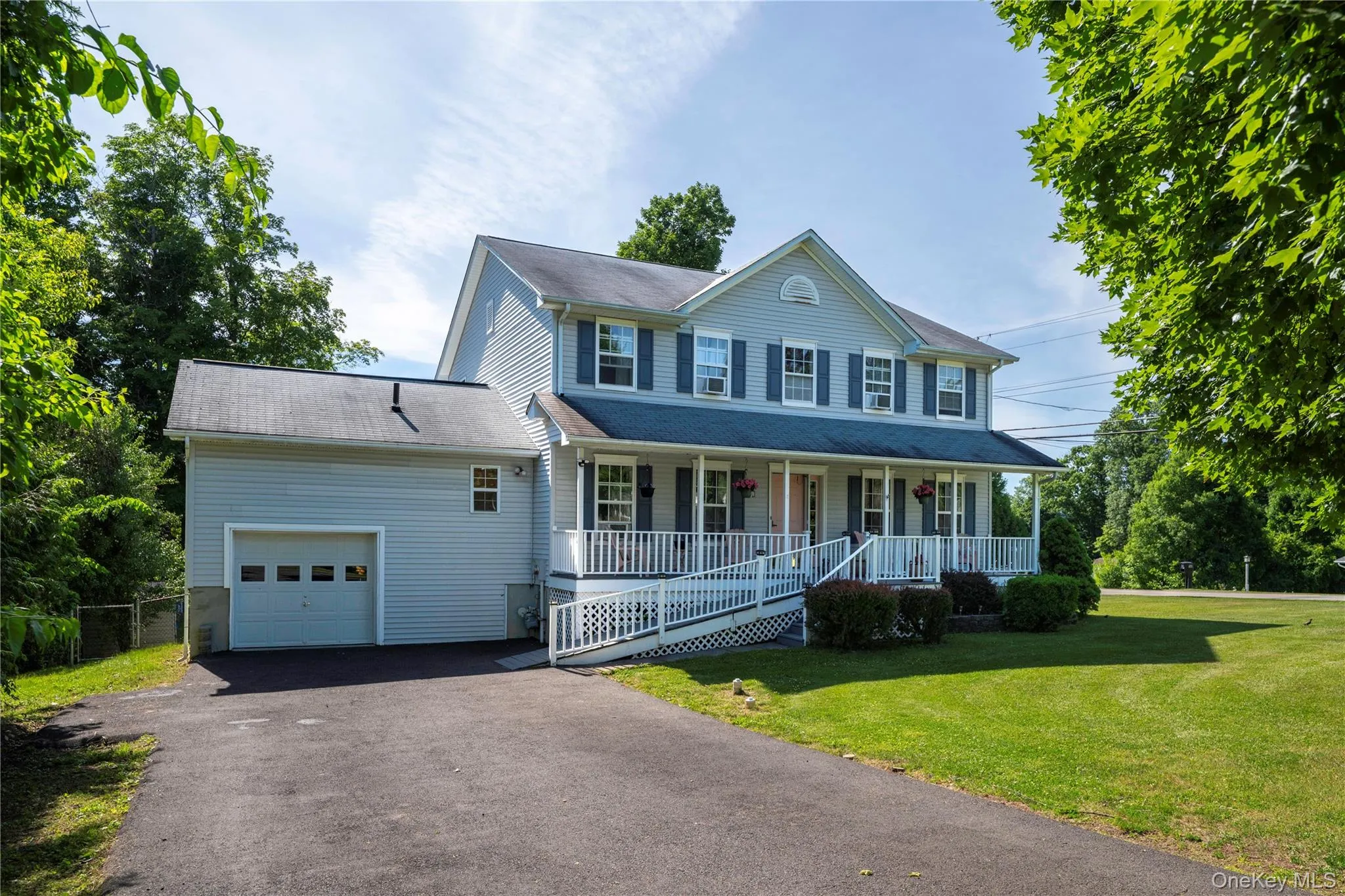 Two-story residence with attached single- car garage Two-story residence with attached single- car garage