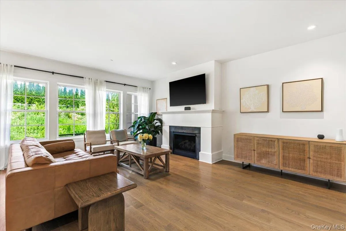 High ceilings, wood floors throughout, family room with fireplace High ceilings, wood floors throughout, family room with fireplace