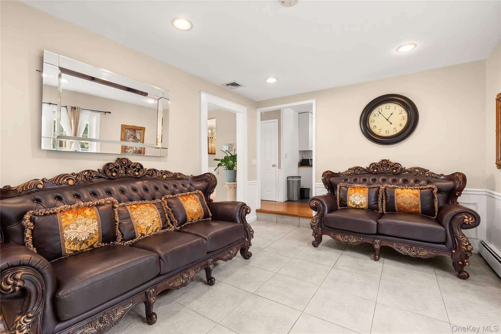 Spacious family room featuring fireplace and sliders leading to your beautiful yard Spacious family room featuring fireplace and sliders leading to your beautiful yard