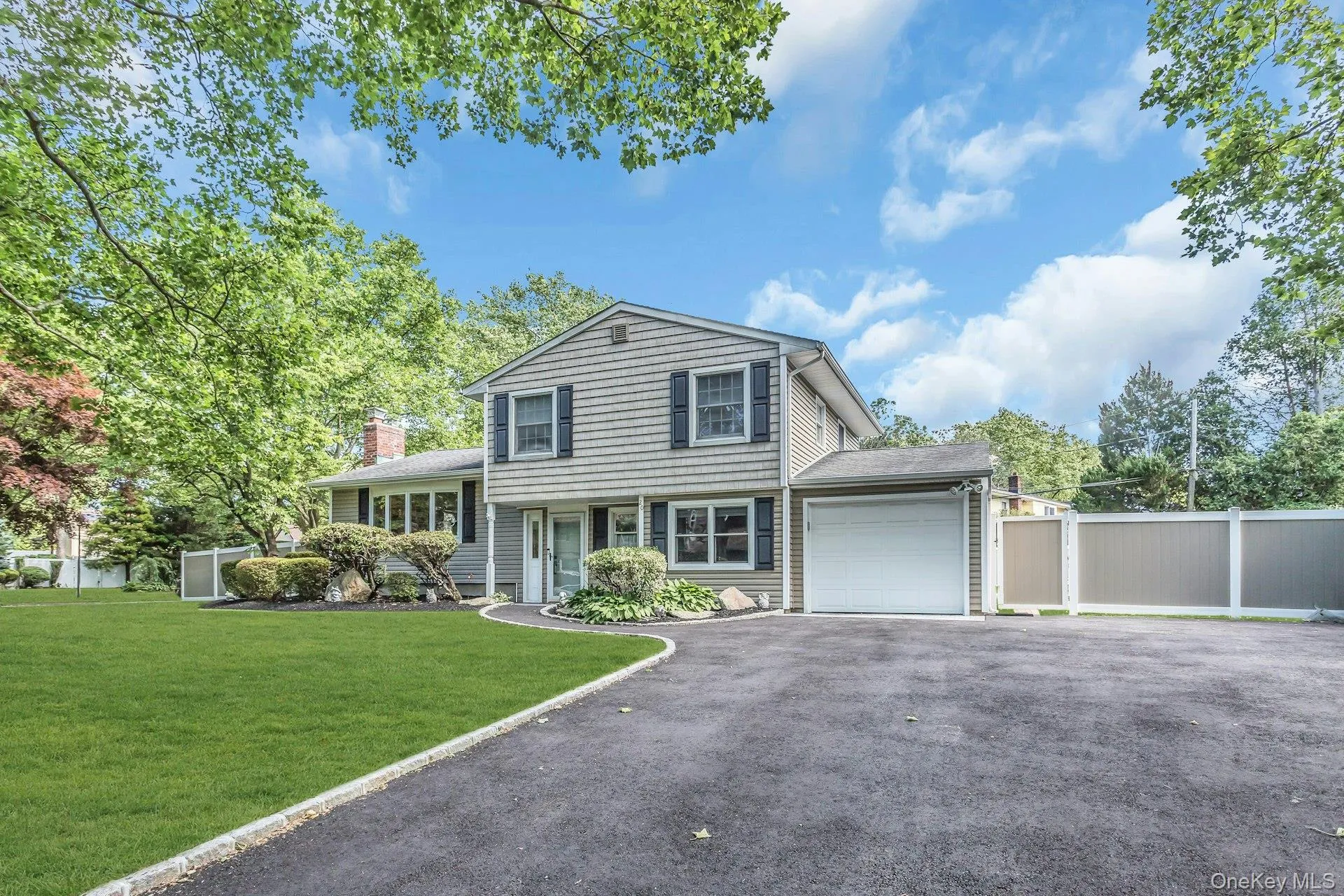 Newly renovated two car driveway with beautiful walkway Newly renovated two car driveway with beautiful walkway