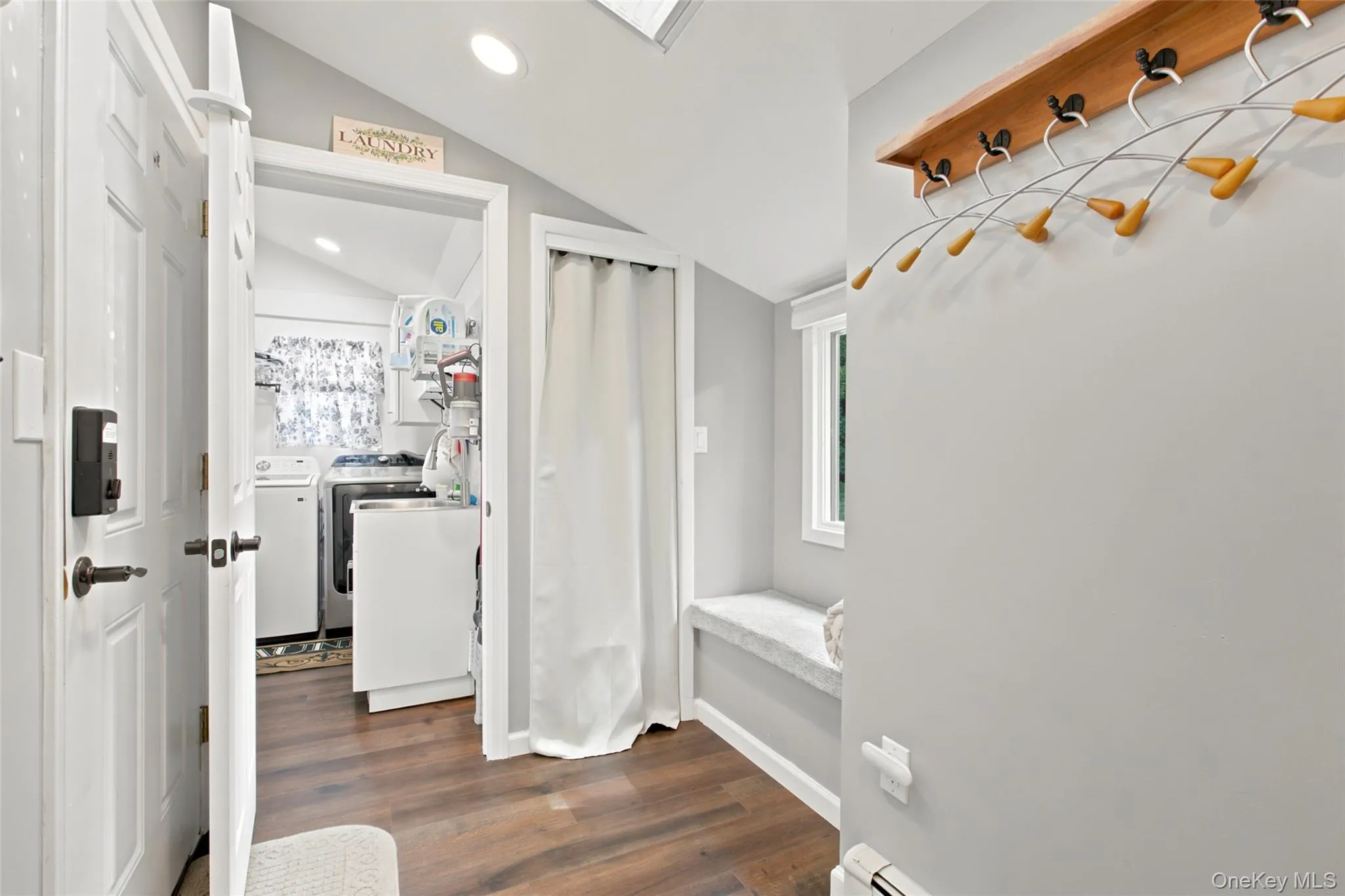 Laundry room with attached mud room off garage Laundry room with attached mud room off garage
