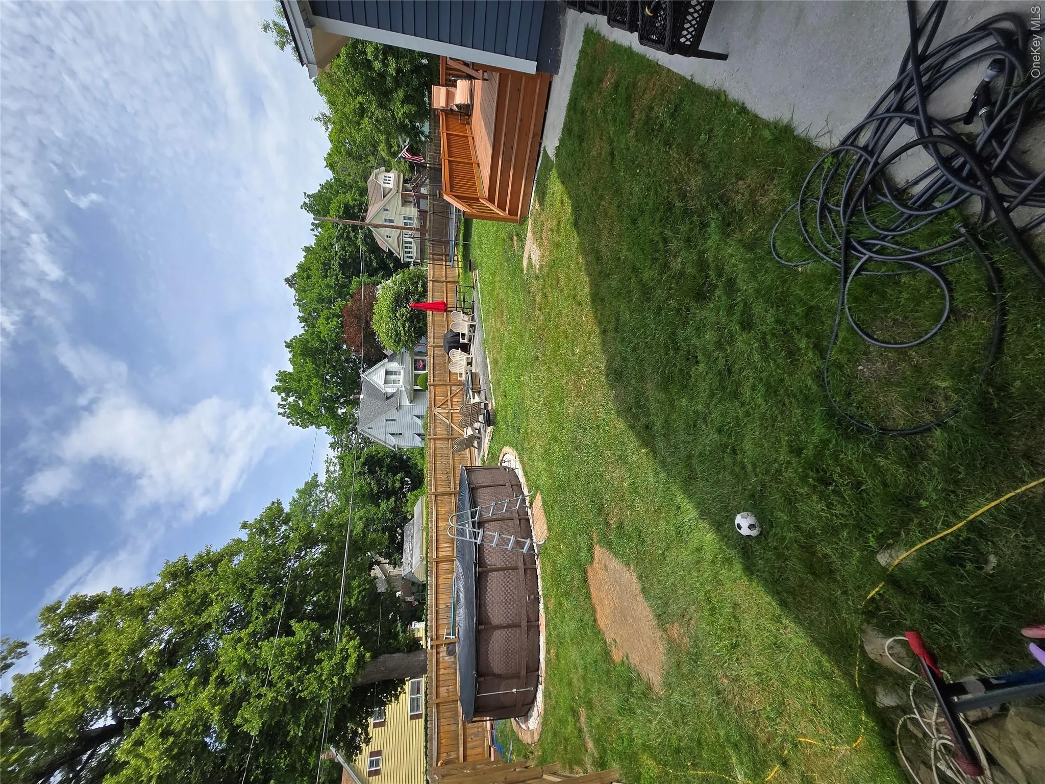 View of pool and yard. View of pool and yard.