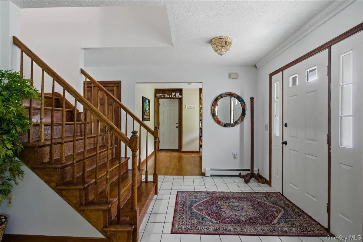 Foyer featuring oversized staircase Foyer featuring oversized staircase