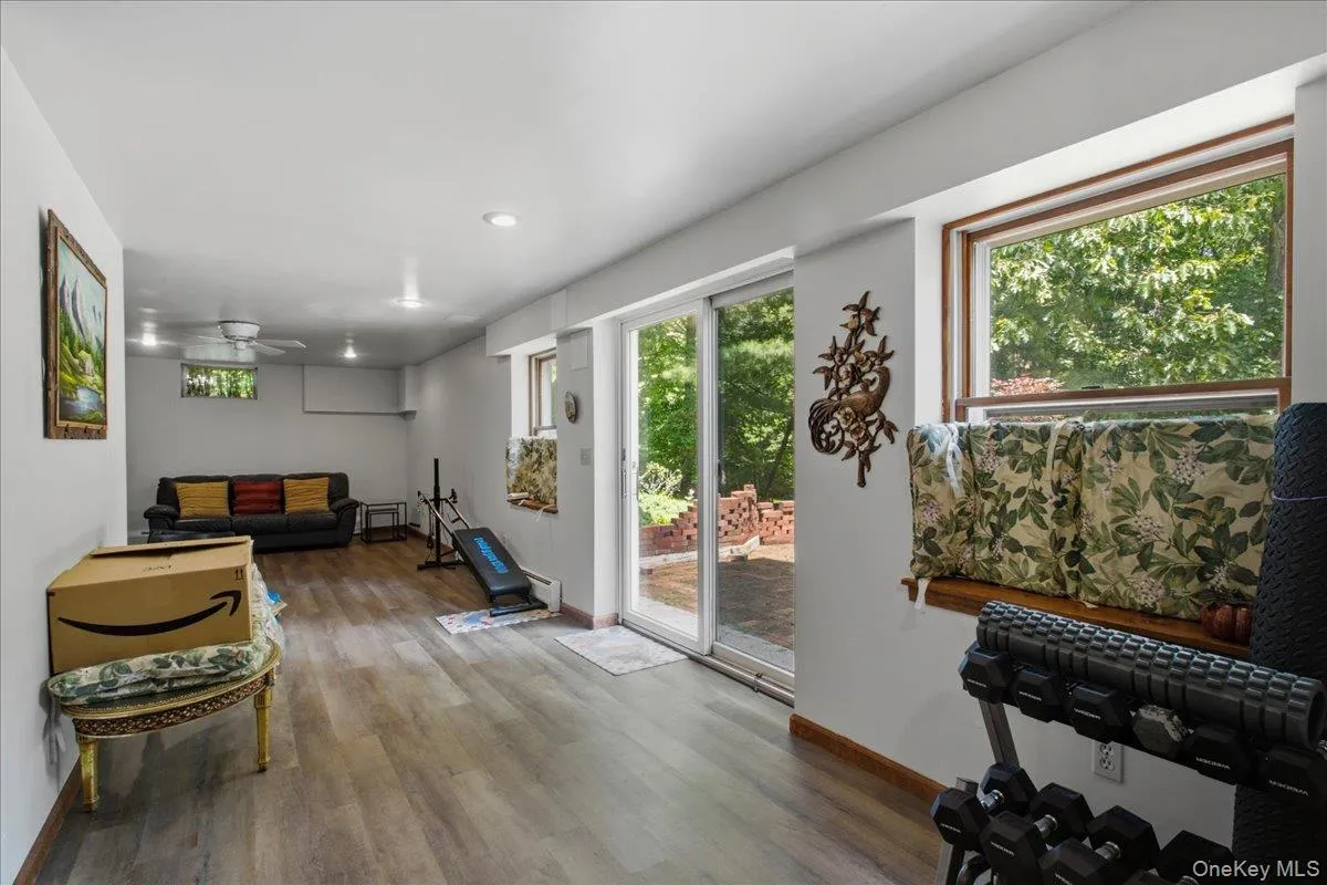 Finished basement with sliding doors to patio Finished basement with sliding doors to patio