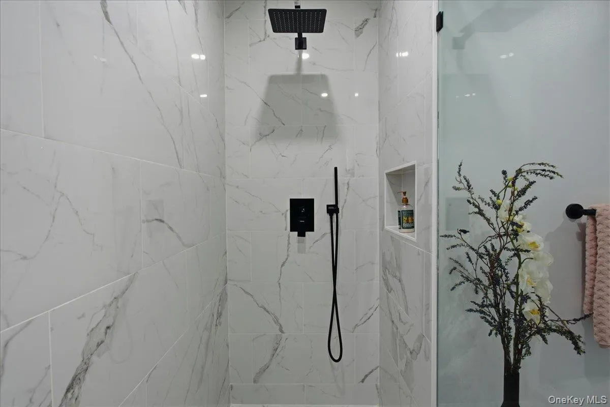 Primary bathroom with curbless walk in shower Primary bathroom with curbless walk in shower