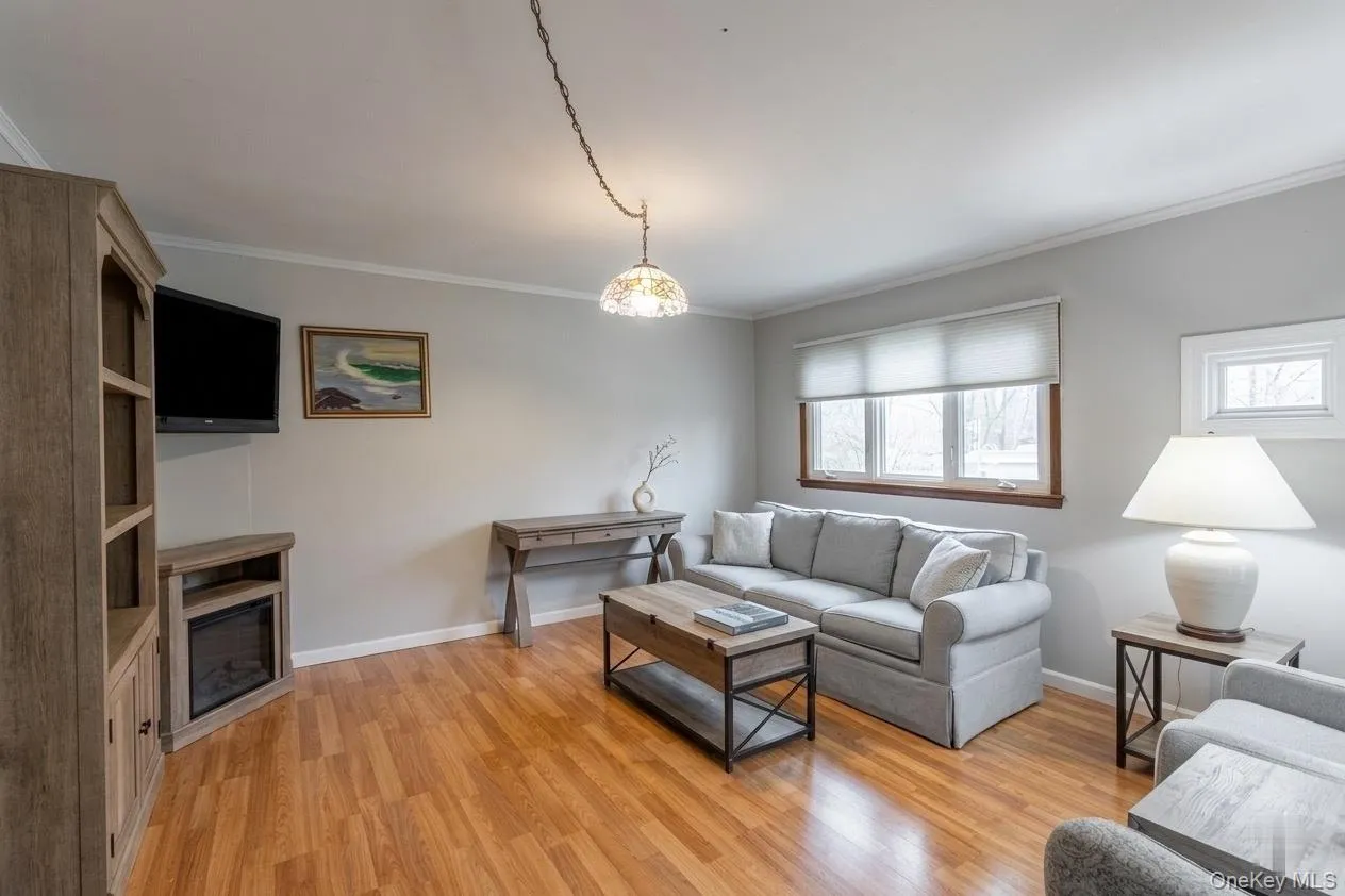 virtually staged lower level living area virtually staged lower level living area