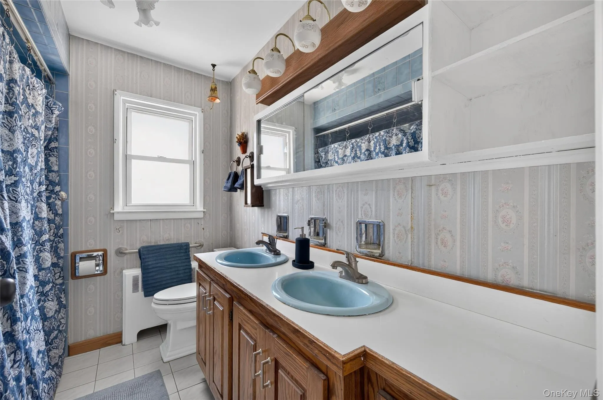 Bathroom with double sink and handicap accessible tub Bathroom with double sink and handicap accessible tub