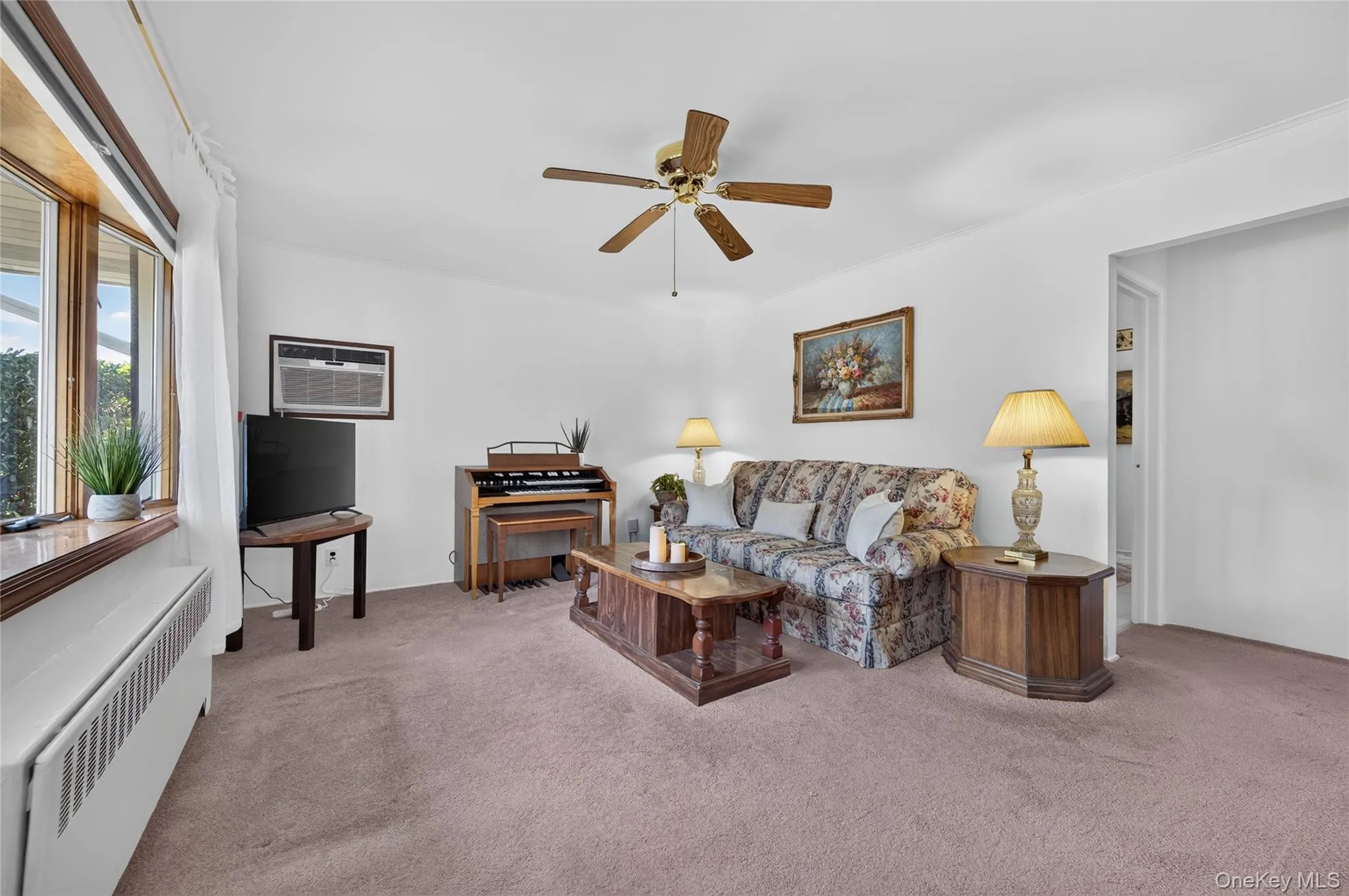Living room with hardwood flooring under carpet Living room with hardwood flooring under carpet