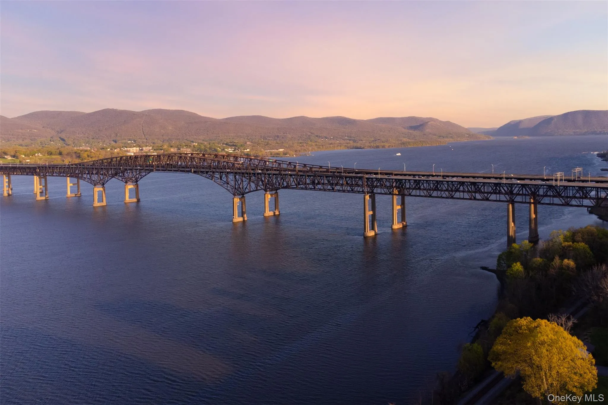 Aerial View of Hudson River with Newburgh Beacon Bridge + Mountains facing South Aerial View of Hudson River with Newburgh Beacon Bridge + Mountains facing South