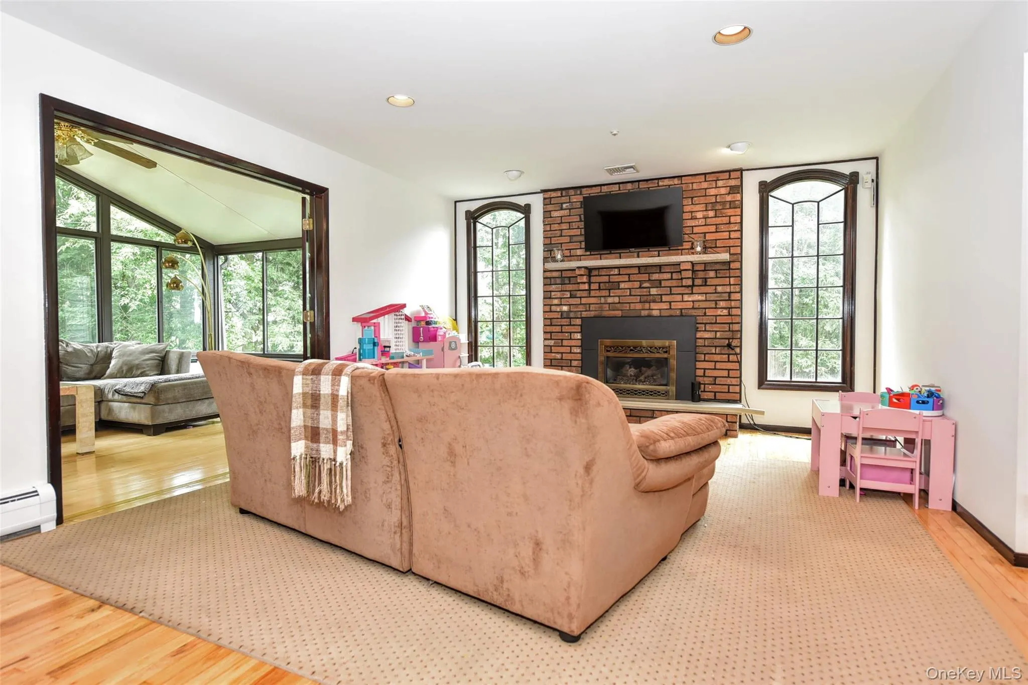 Family Rm with wood burning fireplace. Family Rm with wood burning fireplace.