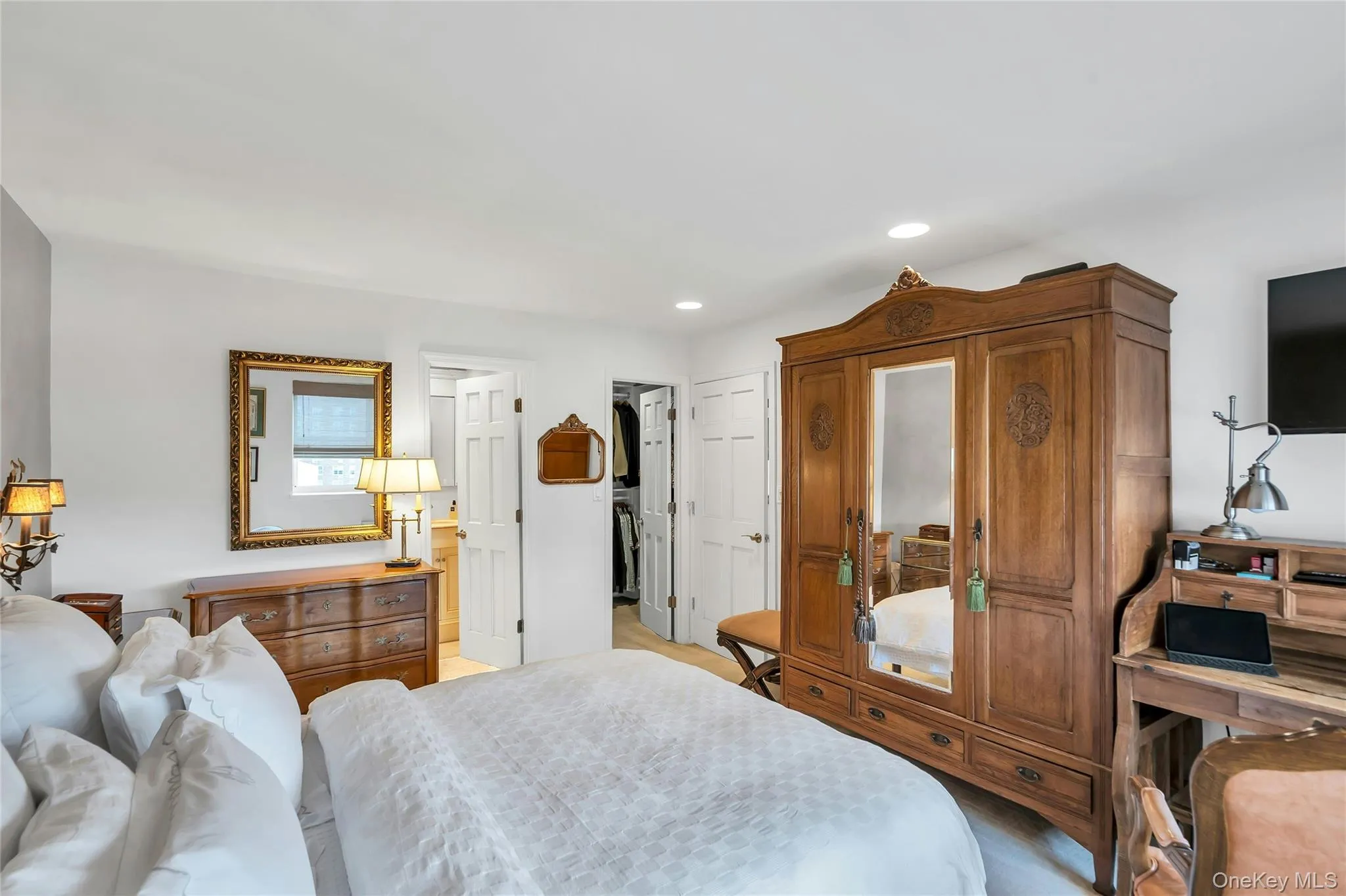 Opposite View Bedroom with peek into the closet and bathroom Opposite View Bedroom with peek into the closet and bathroom