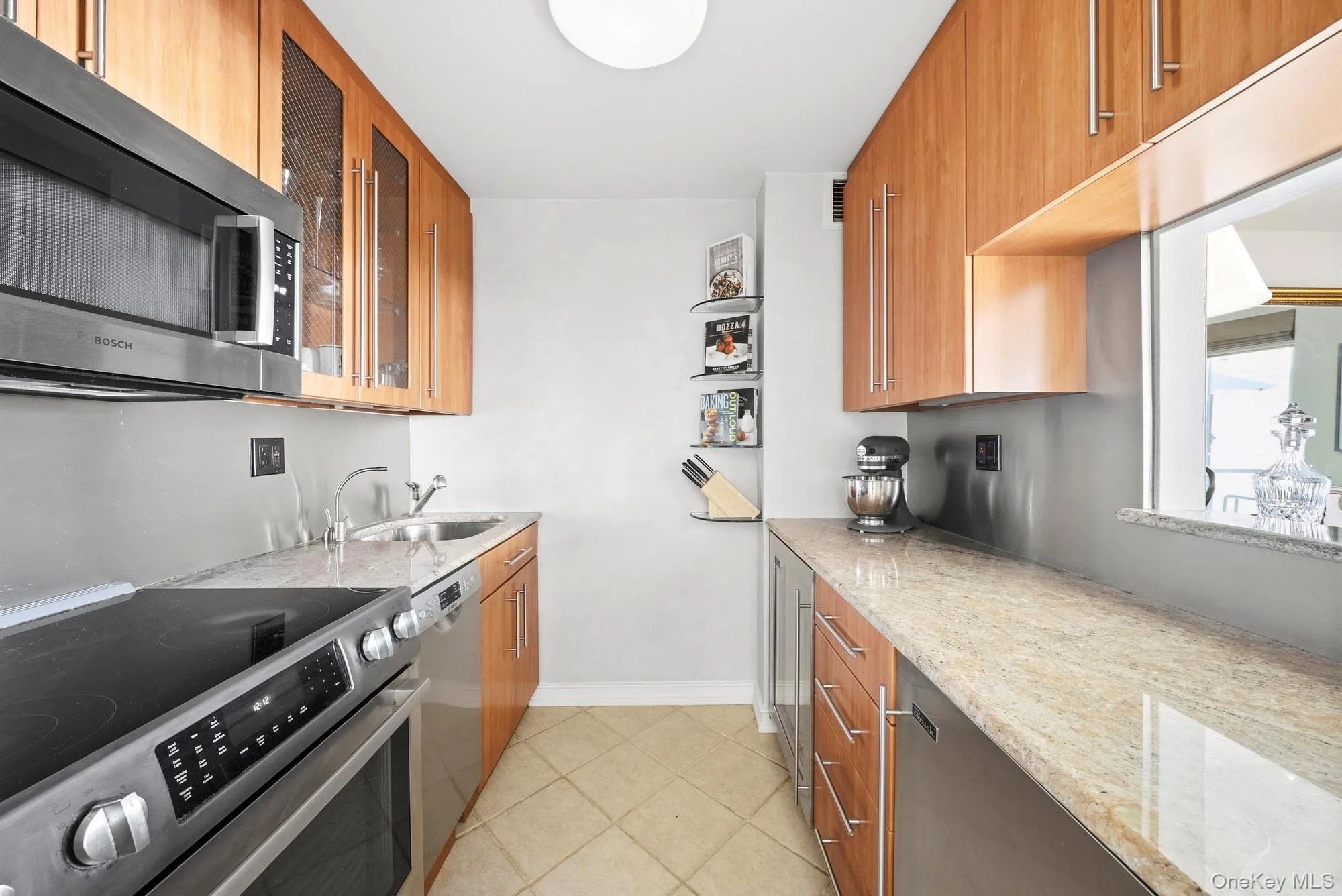 Galley Kitchen equip with high end Bosche en-suite and Perlick under-counter refrigerator and freezer. Galley Kitchen equip with high end Bosche en-suite and Perlick under-counter refrigerator and freezer.