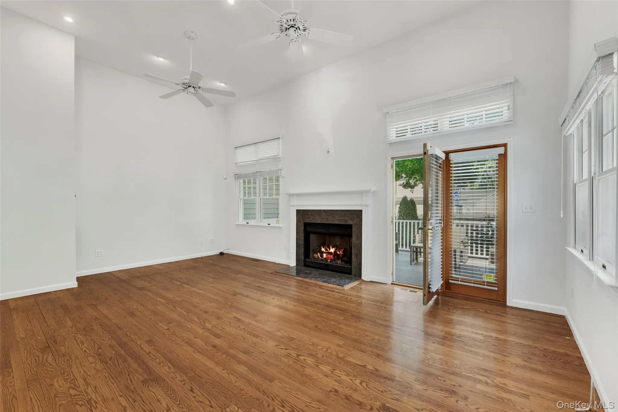 Living room features a gas fireplace. Living room features a gas fireplace.