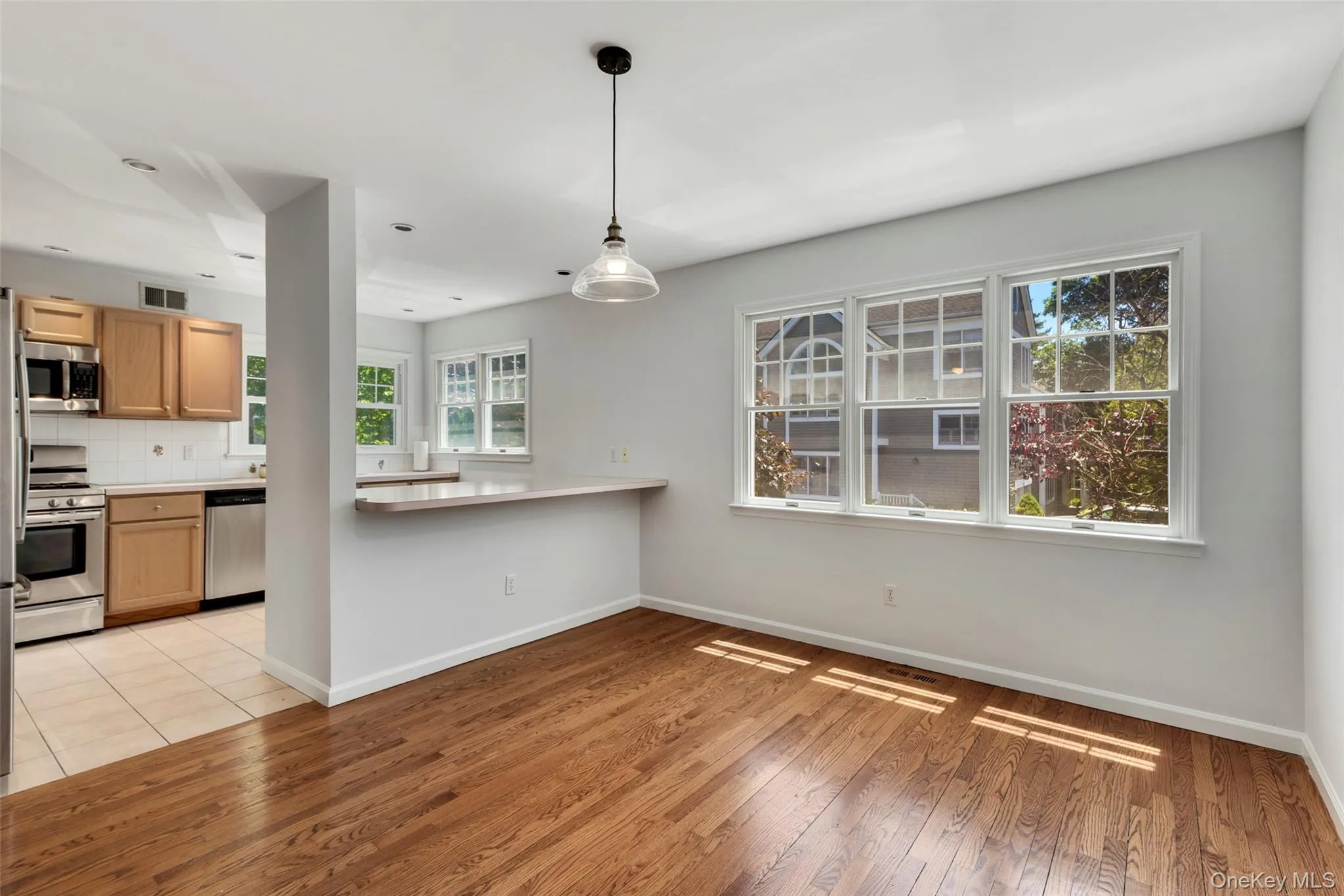 Kitchen conveniently opens to the dining room. Kitchen conveniently opens to the dining room.