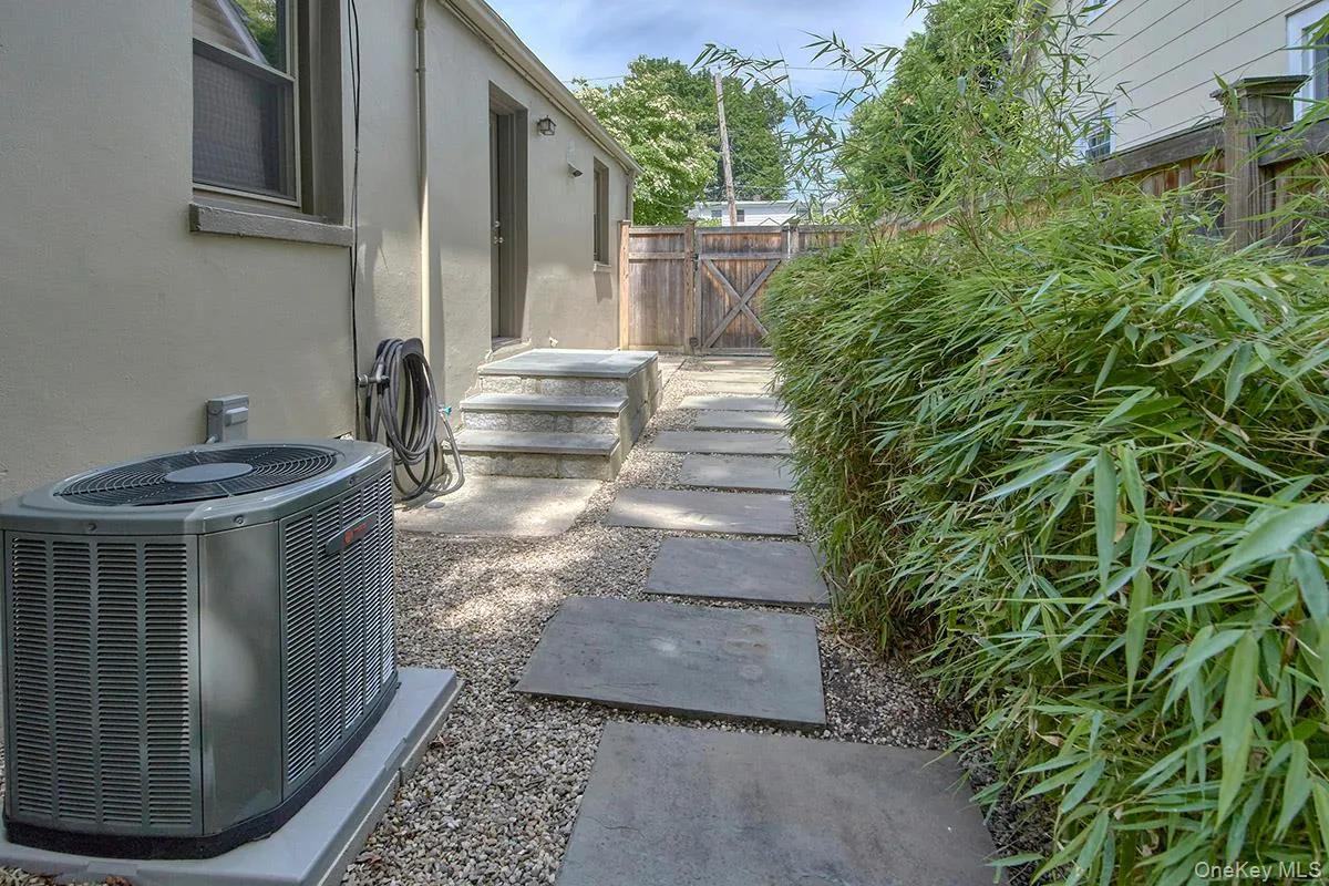 Door and steps out from kitchen. 2 year old Central air. Door and steps out from kitchen. 2 year old Central air.