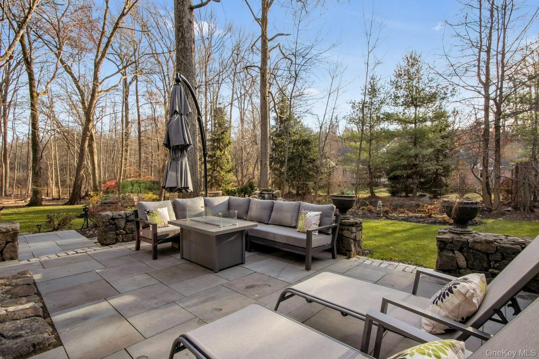 View of patio / terrace featuring an outdoor living space with a fire pit View of patio / terrace featuring an outdoor living space with a fire pit