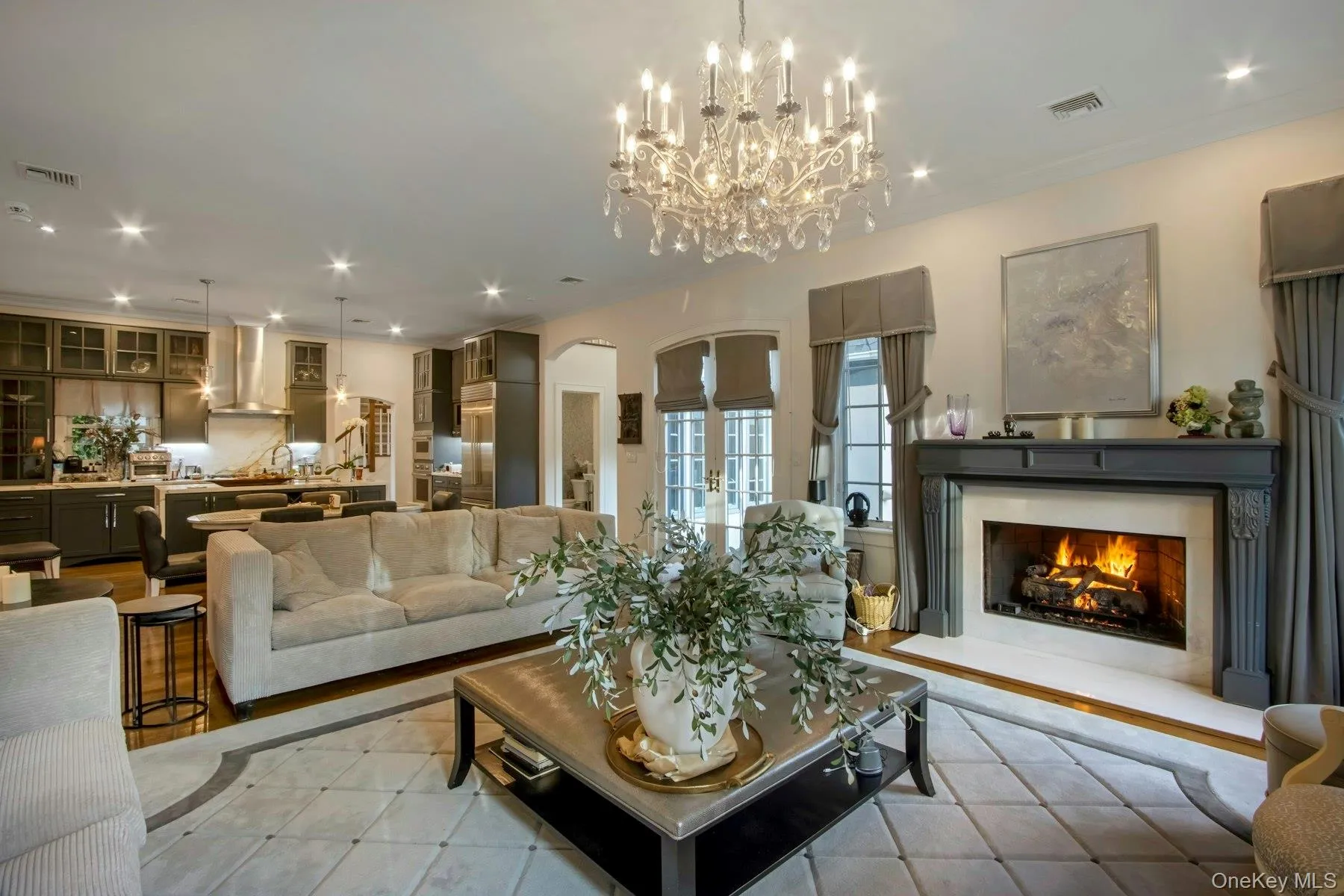 Family room with a notable chandelier Family room with a notable chandelier