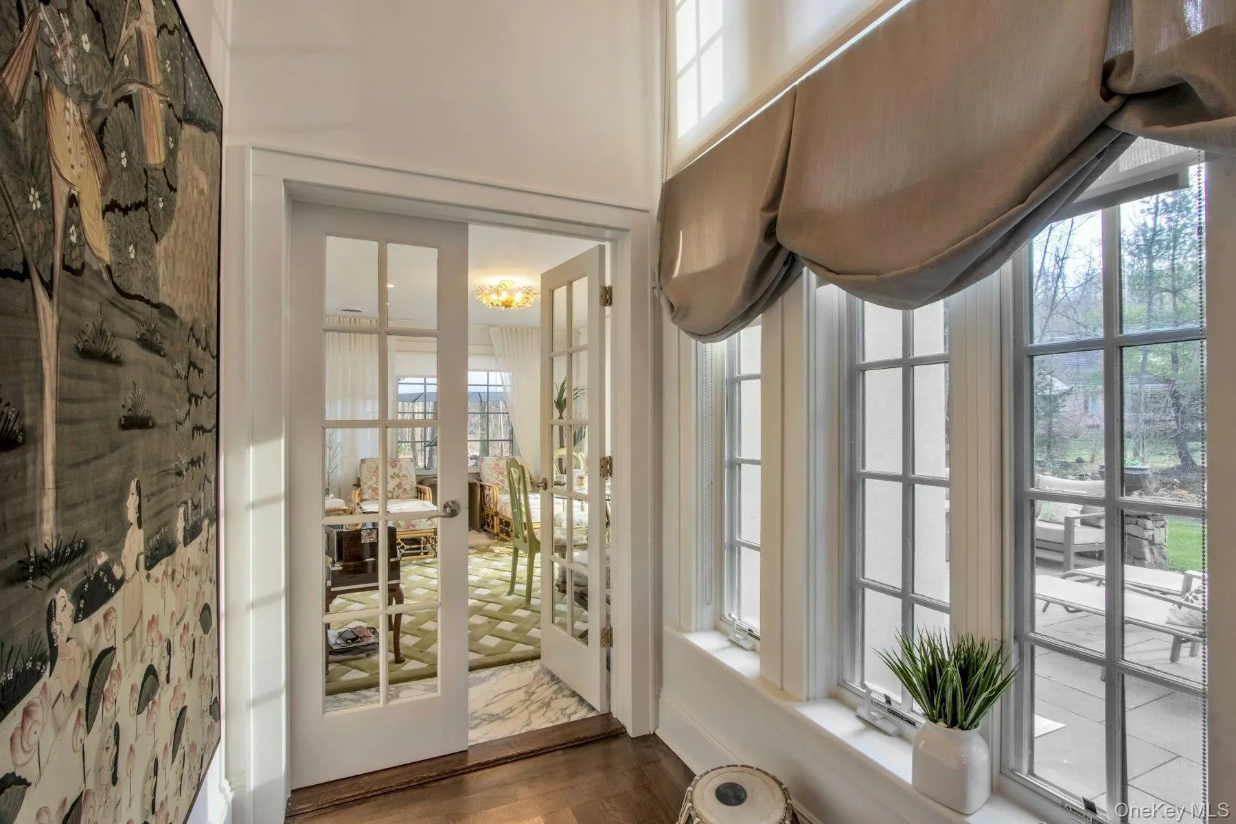 Entryway with dark hardwood / wood-style floors Entryway with dark hardwood / wood-style floors