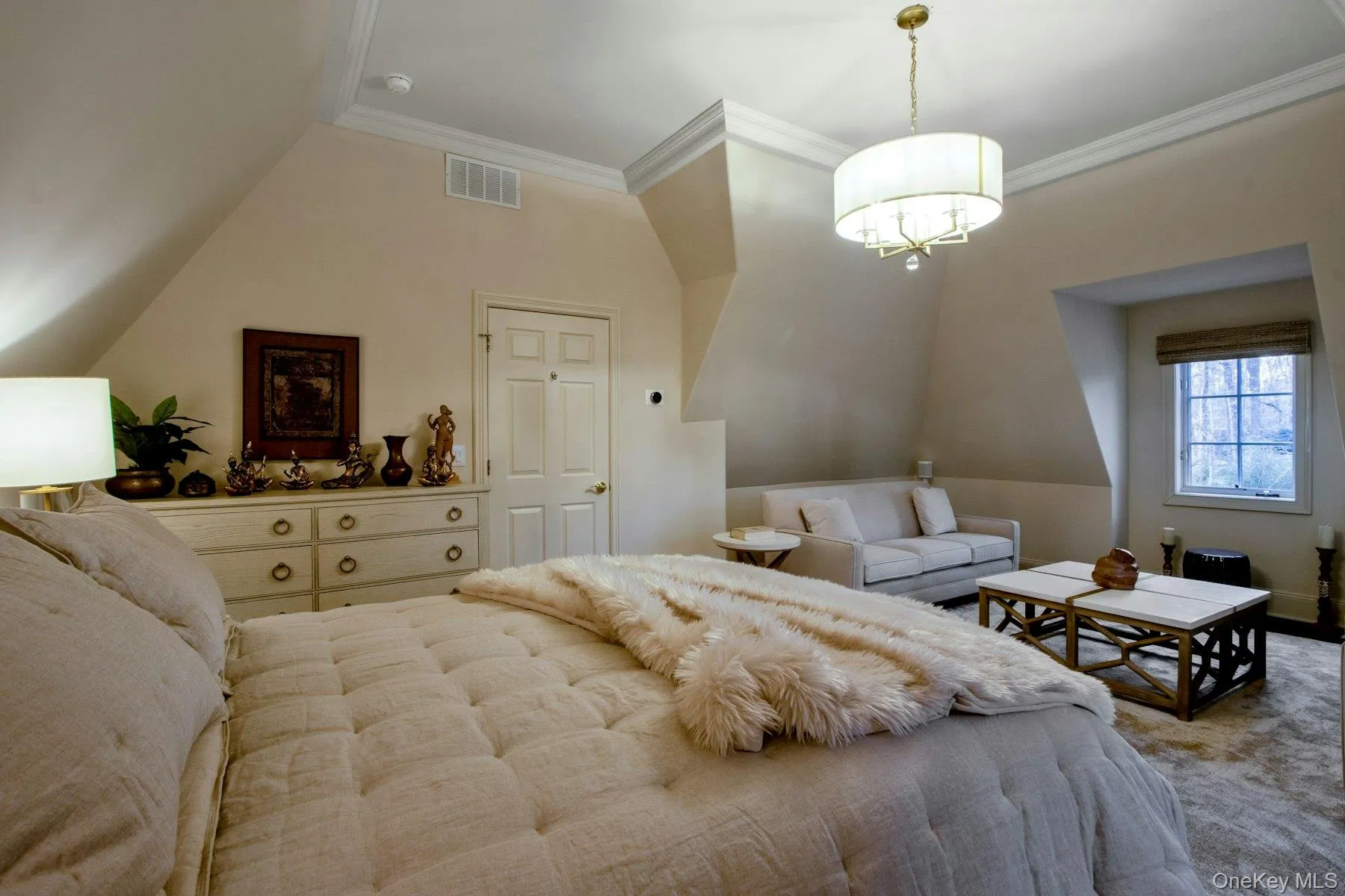 Bedroom featuring crown molding Bedroom featuring crown molding