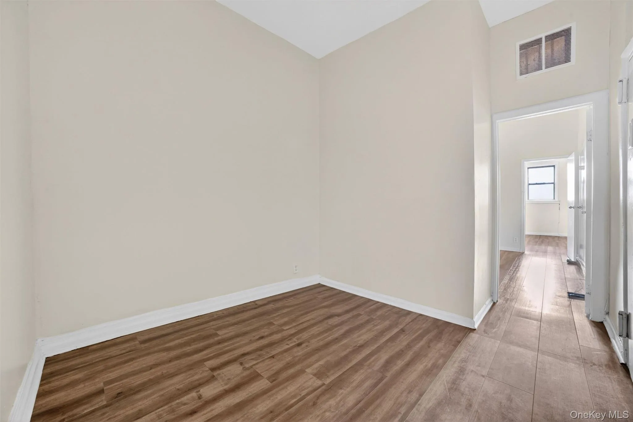 Dining/Living Room with view into tho bedrooms Dining/Living Room with view into tho bedrooms