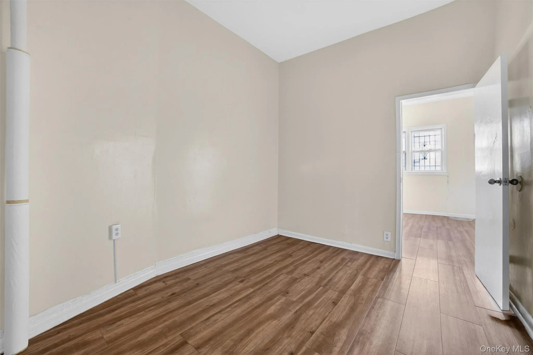 2nd Bedroom can be used as living room. View of primary bedroom beyond 2nd Bedroom can be used as living room. View of primary bedroom beyond