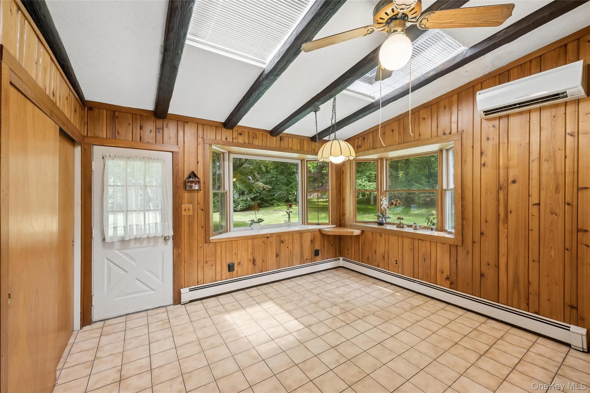 Kitchen has back door from the dining area that leads to the gorgeous back yard. Kitchen has back door from the dining area that leads to the gorgeous back yard.