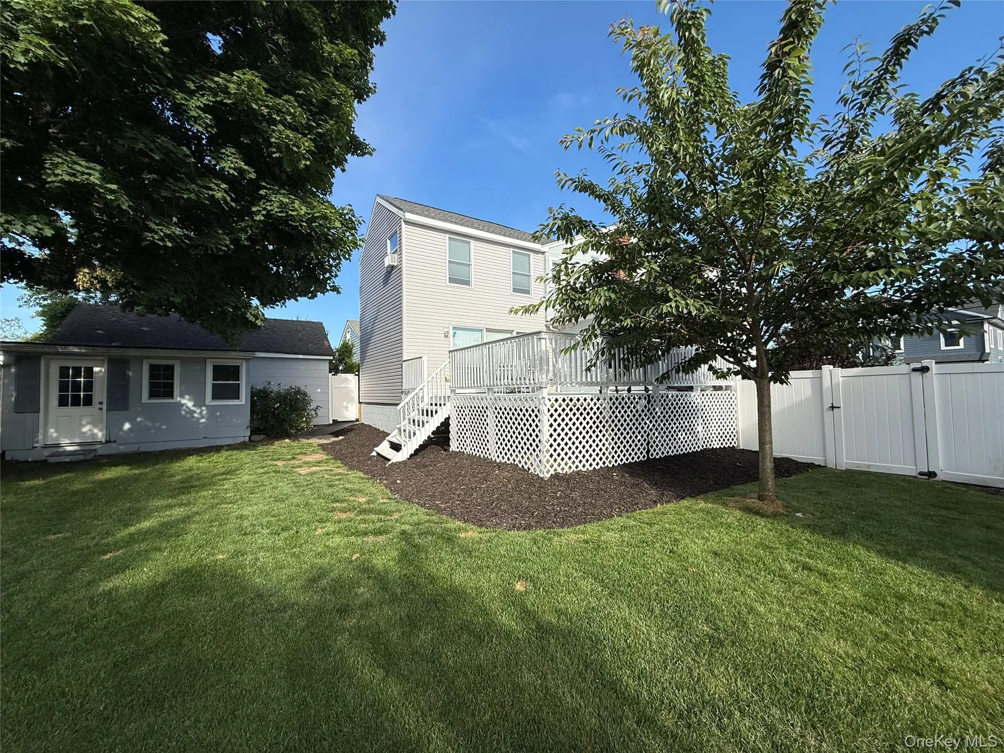 Backyard with View of Accessory Office off Rear of Garage Backyard with View of Accessory Office off Rear of Garage