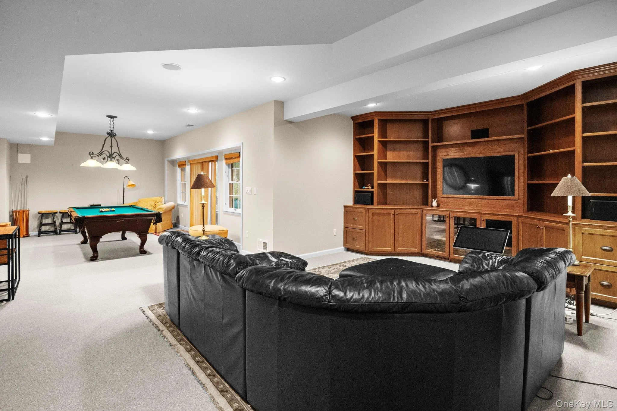 Lower level finished space perfect for entertaining Lower level finished space perfect for entertaining