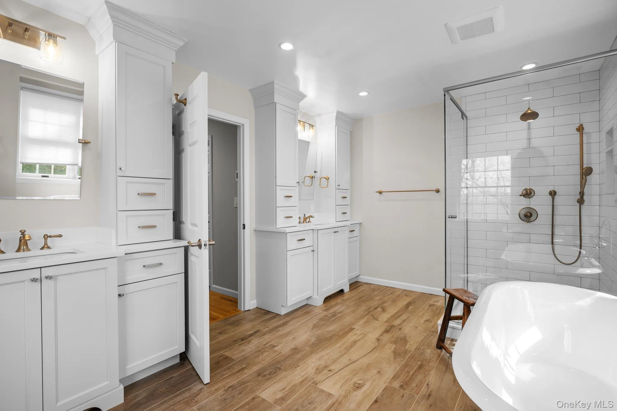 Primary bath features free standing tub and generously sized shower Primary bath features free standing tub and generously sized shower