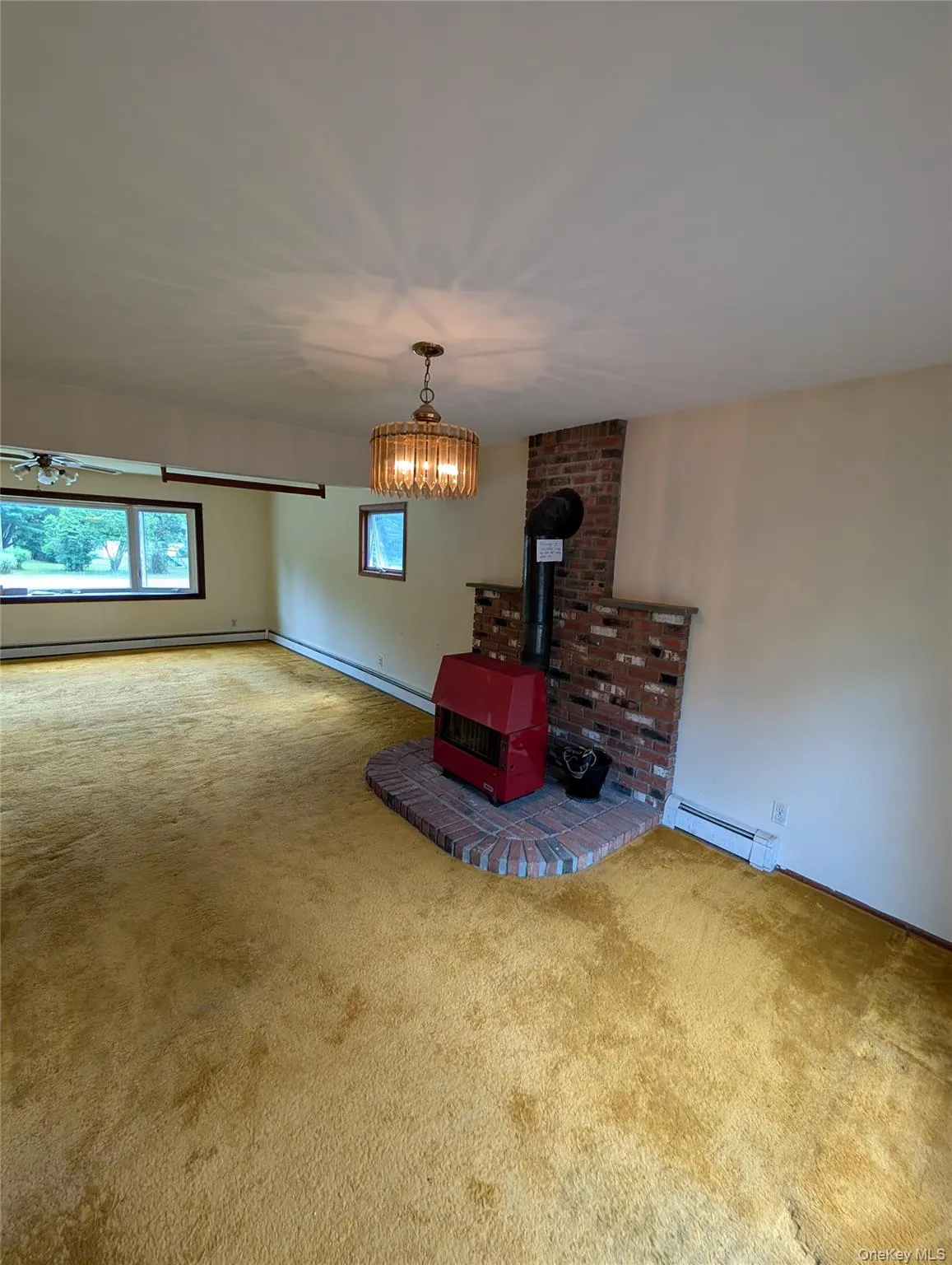 wood or coal burning stove, dining area open into living room wood or coal burning stove, dining area open into living room