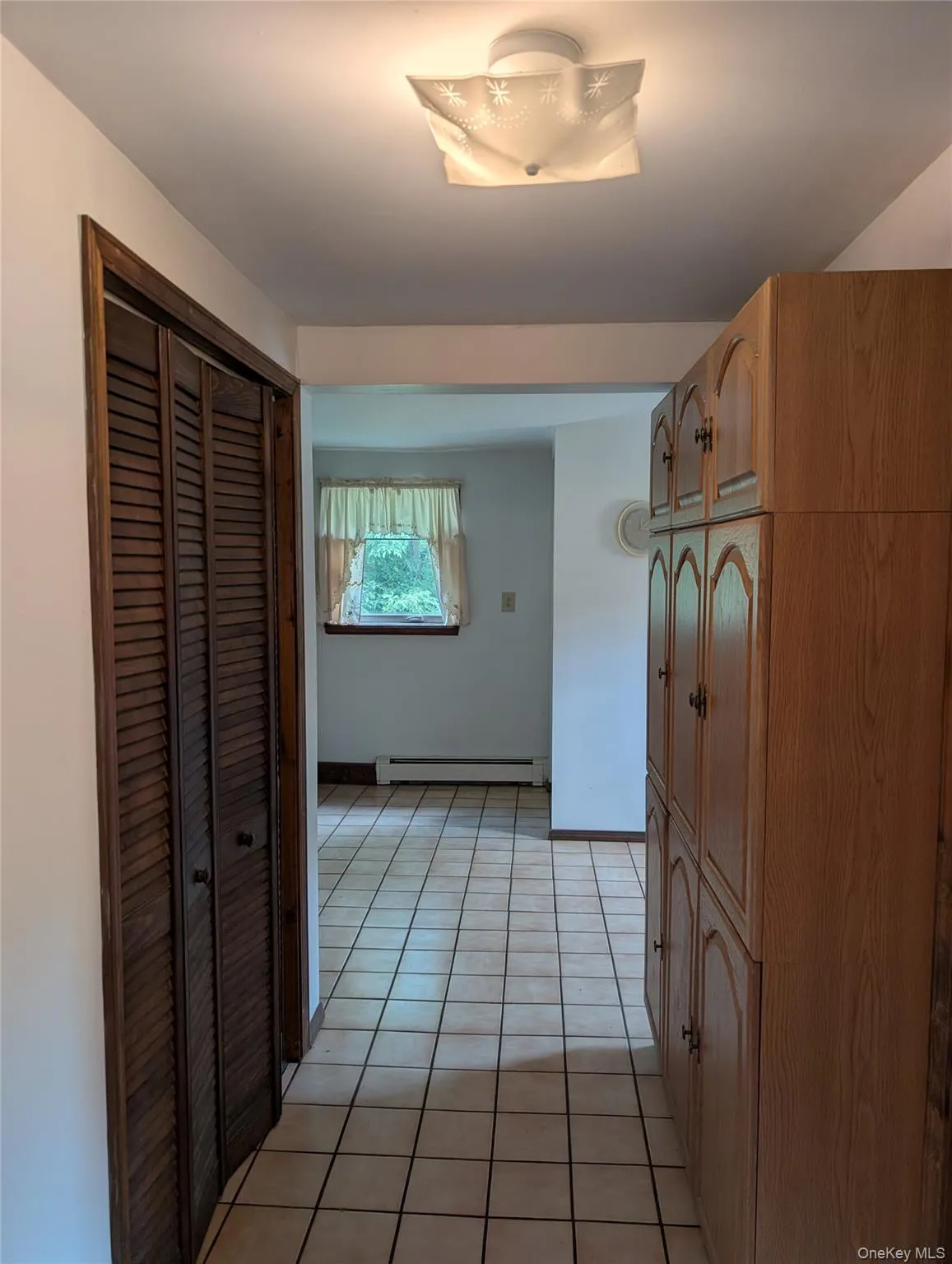 Laundry and Utility Room to the left, Entry to Lower Level/kitchen area Laundry and Utility Room to the left, Entry to Lower Level/kitchen area