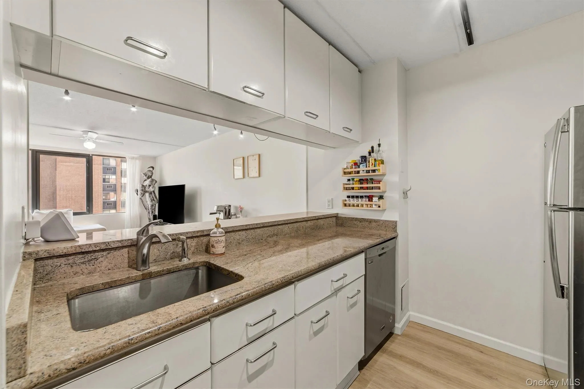 Kitchen featuring granite counter tops Kitchen featuring granite counter tops
