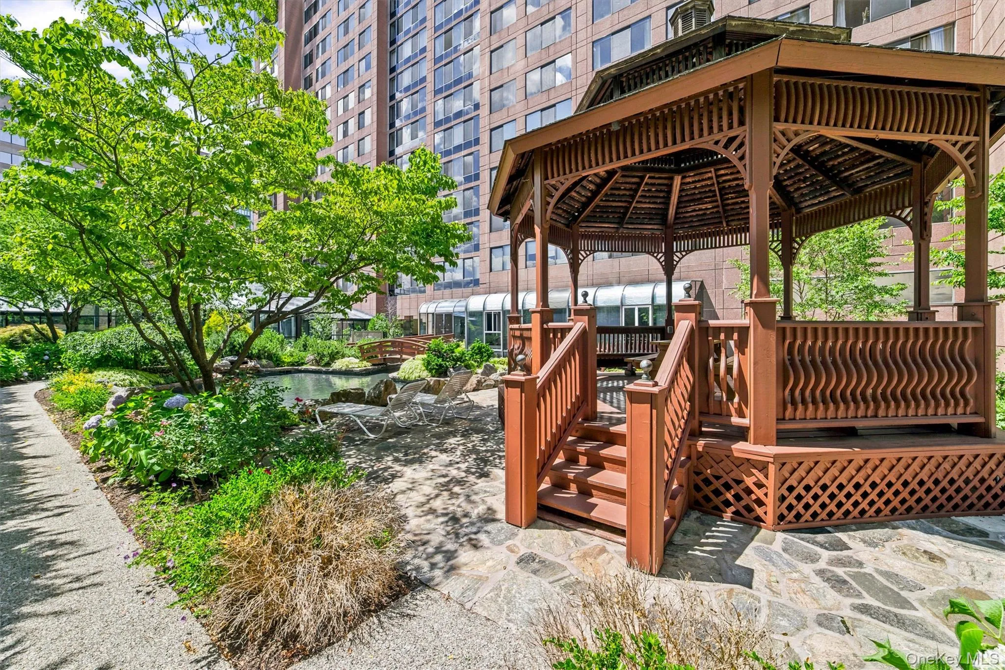 Picturesque Gazebo nestled within the community's landscaped grounds Picturesque Gazebo nestled within the community's landscaped grounds