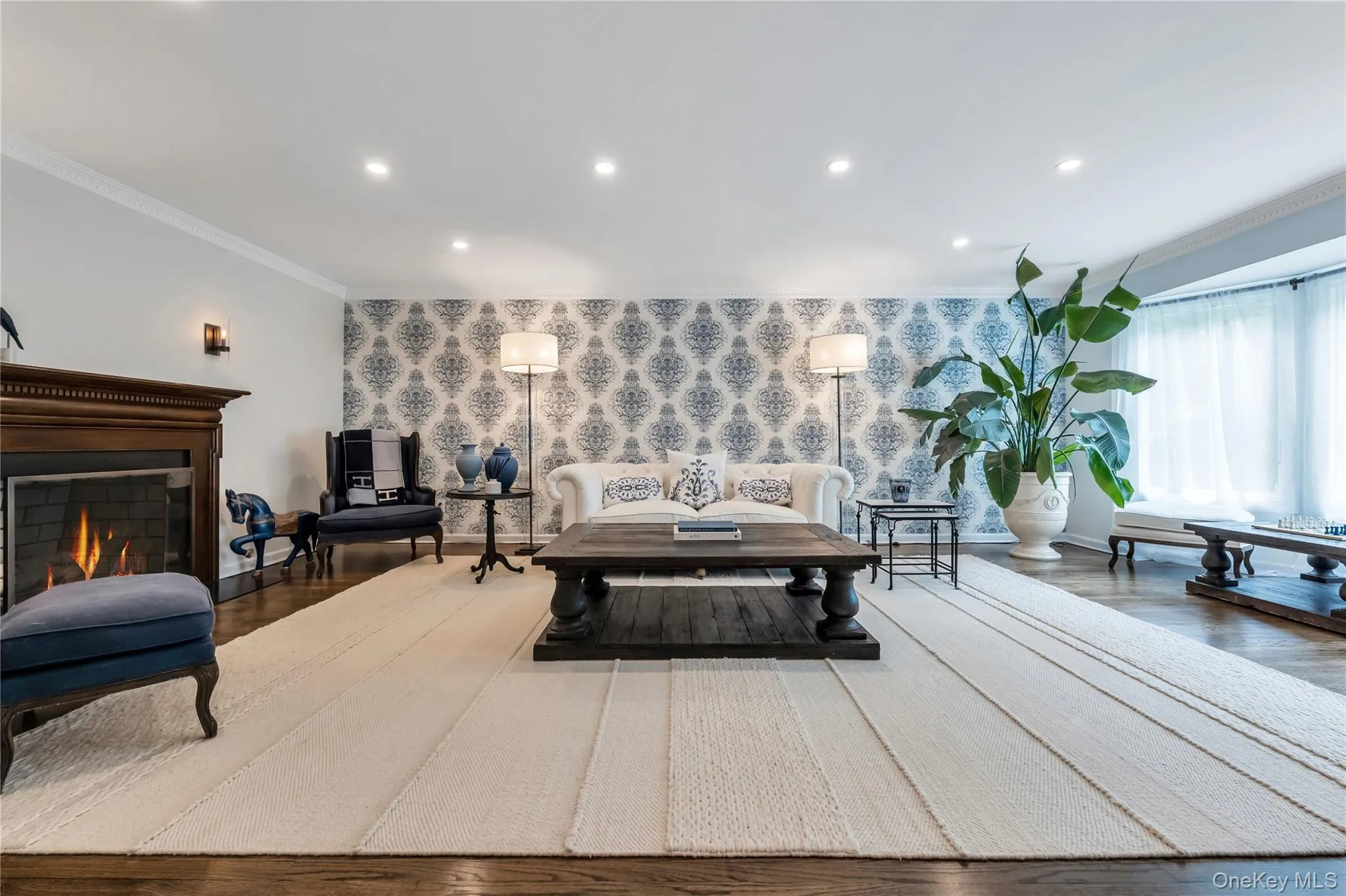 Formal living room with an elegant blue and white design. Formal living room with an elegant blue and white design.