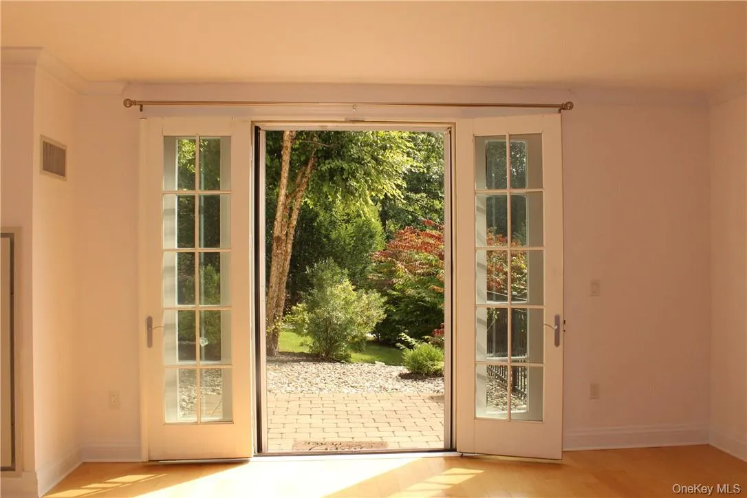 French doors leads to a paver patio. French doors leads to a paver patio.