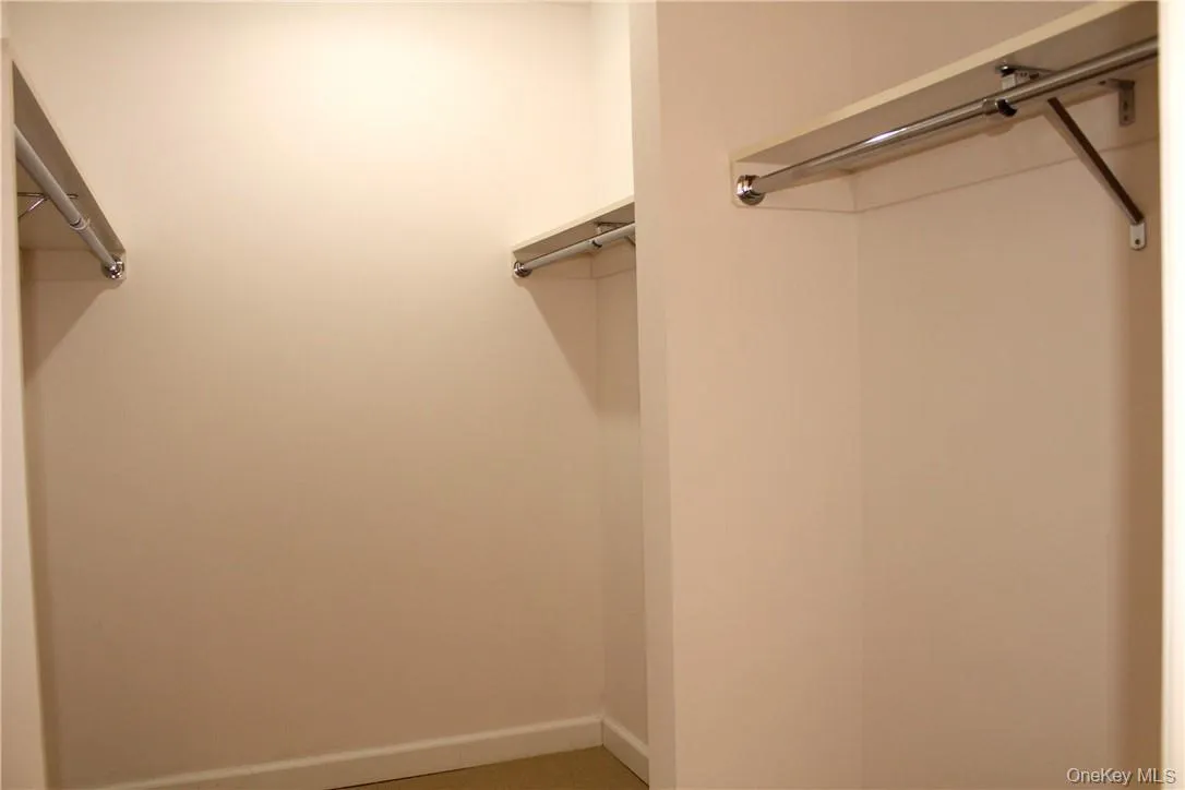 Primary walk in closet Primary walk in closet