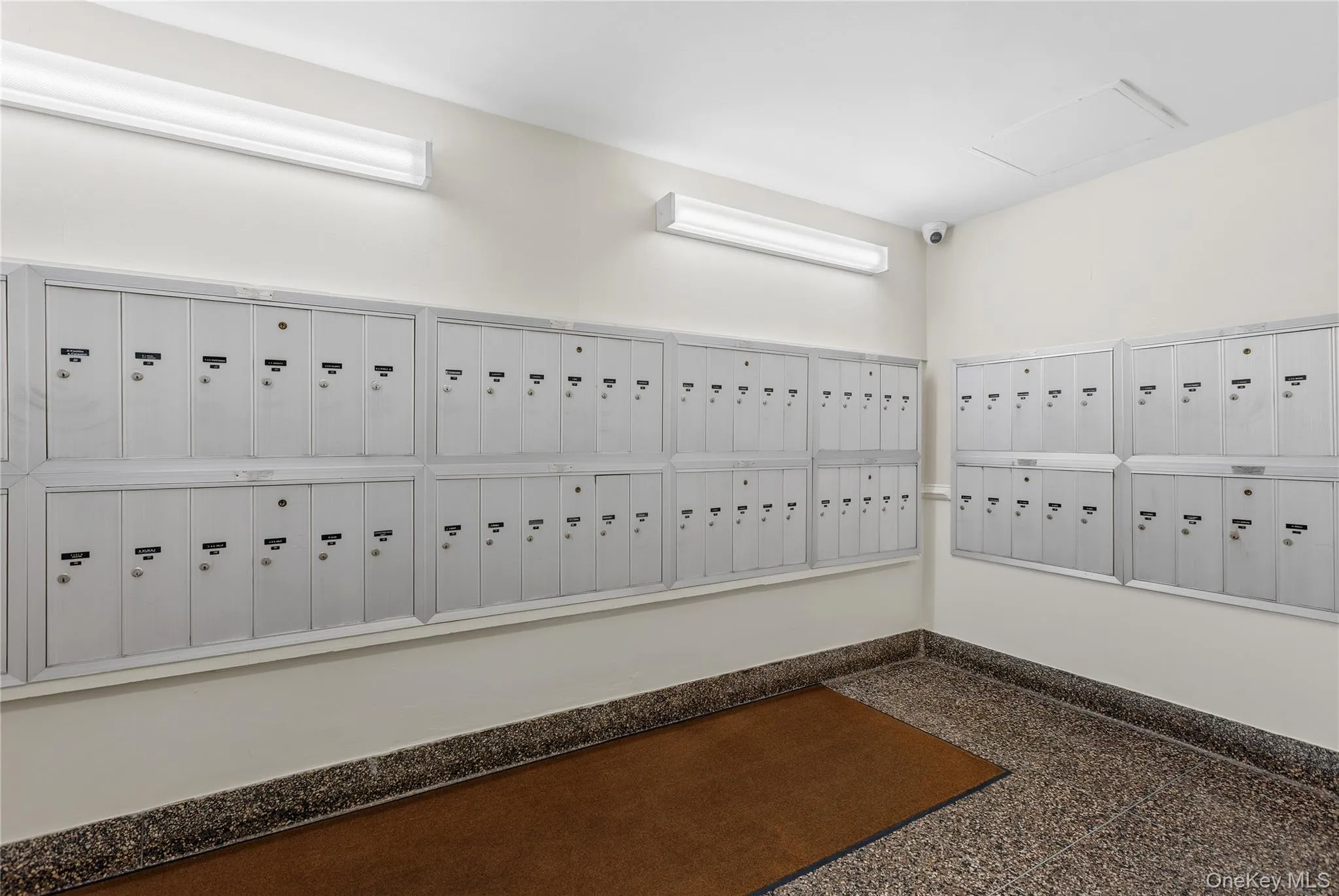 Wall-mounted mailboxes with individual locking compartments Wall-mounted mailboxes with individual locking compartments