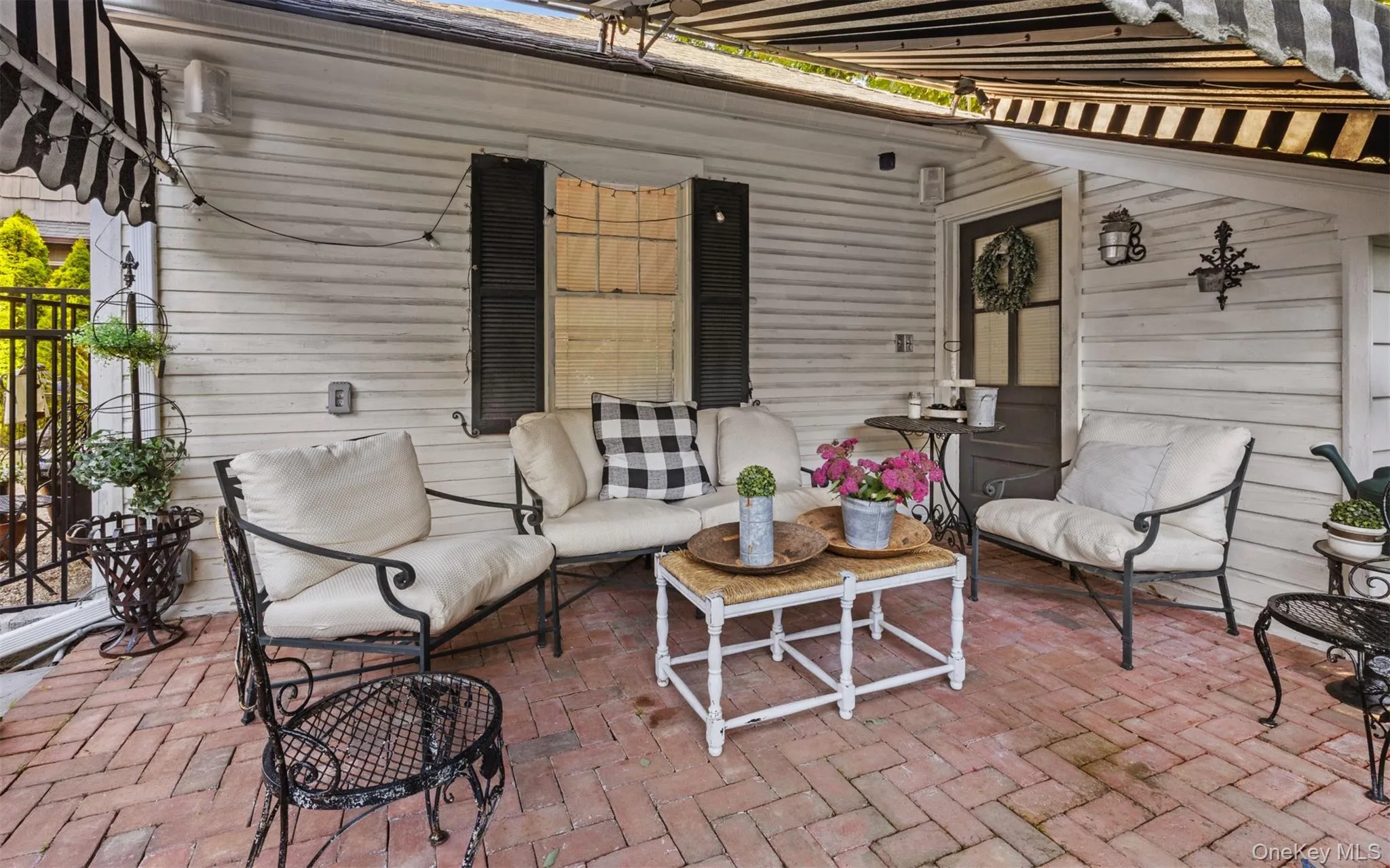 Brick patio with awning, oozing with charm Brick patio with awning, oozing with charm