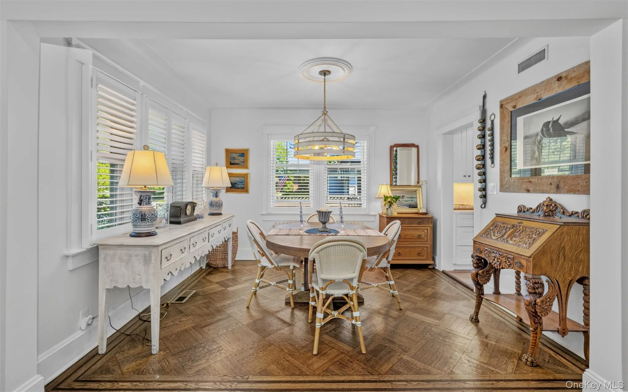 Dining Room with herringbone hardwood floors Dining Room with herringbone hardwood floors