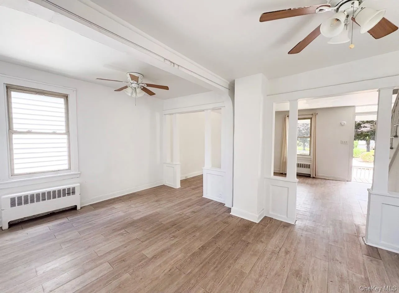 Dinging room into living room and front enterance. Dinging room into living room and front enterance.