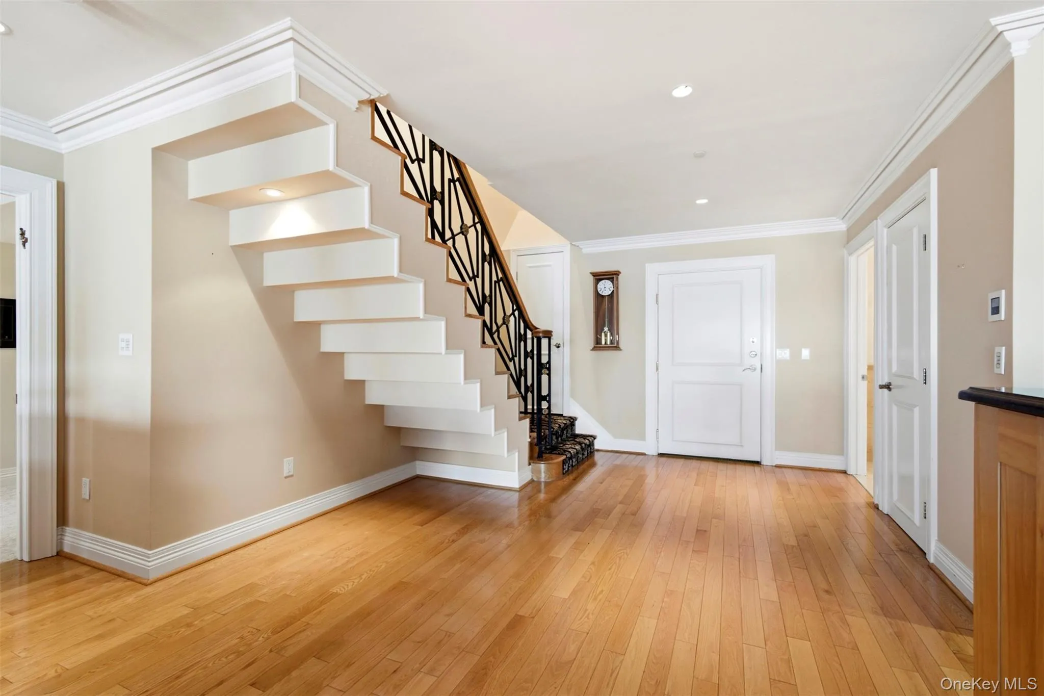 Beautiful stair detail in the entrance foyer. Beautiful stair detail in the entrance foyer.