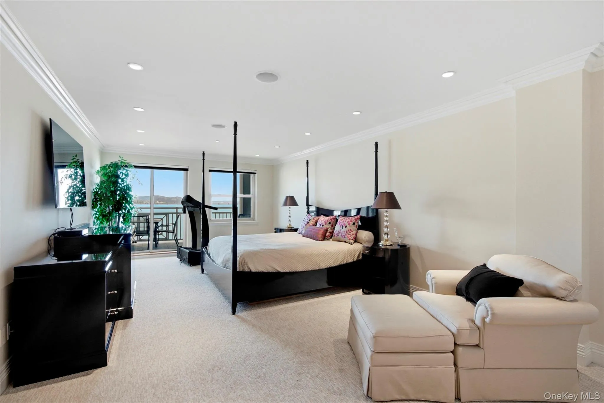 Primary Bedroom en suite with Hudson River views, deck access, and en suite bath. Primary Bedroom en suite with Hudson River views, deck access, and en suite bath.